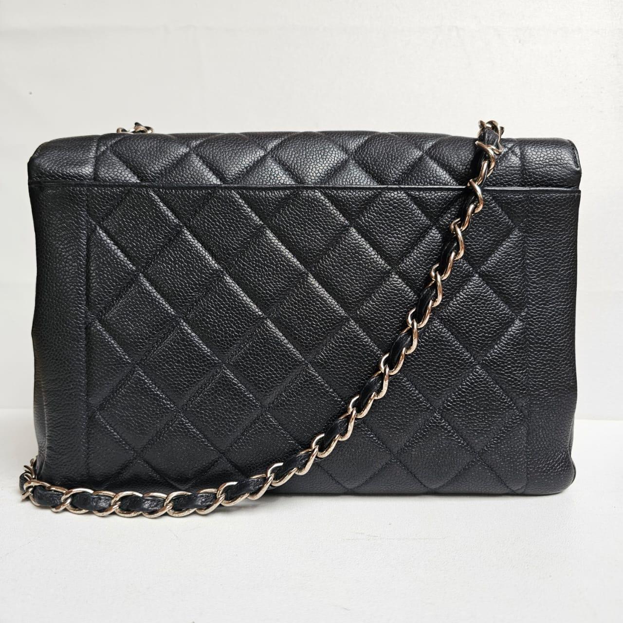Women's or Men's Rare Vintage 1990s Chanel Black Caviar Jumbo Diana Flap Bag For Sale