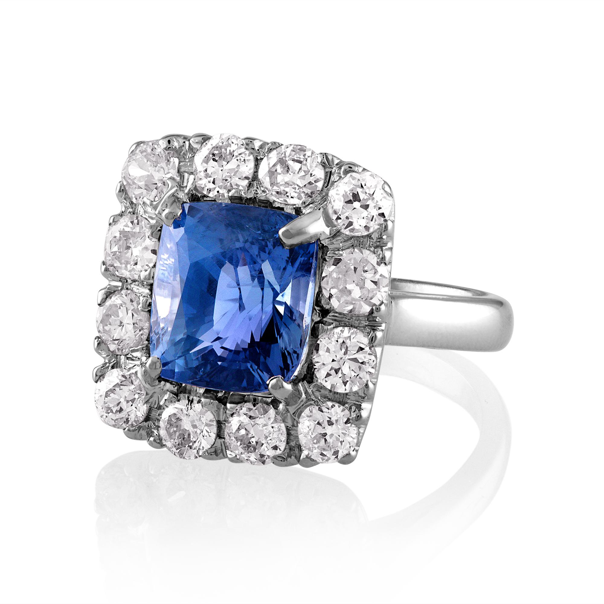 Gorgeous Timeless Rare Vintage AGL 8.65CTW Unheated Color-Shift Ceylon Sapphire and Diamond Ring 18KWG.

Classic Vintage Mid-century 8.65ctw Natural Ceylon Unheated Color-Change Sapphire & Diamond Cluster Ring. Make a sparkling statement with this