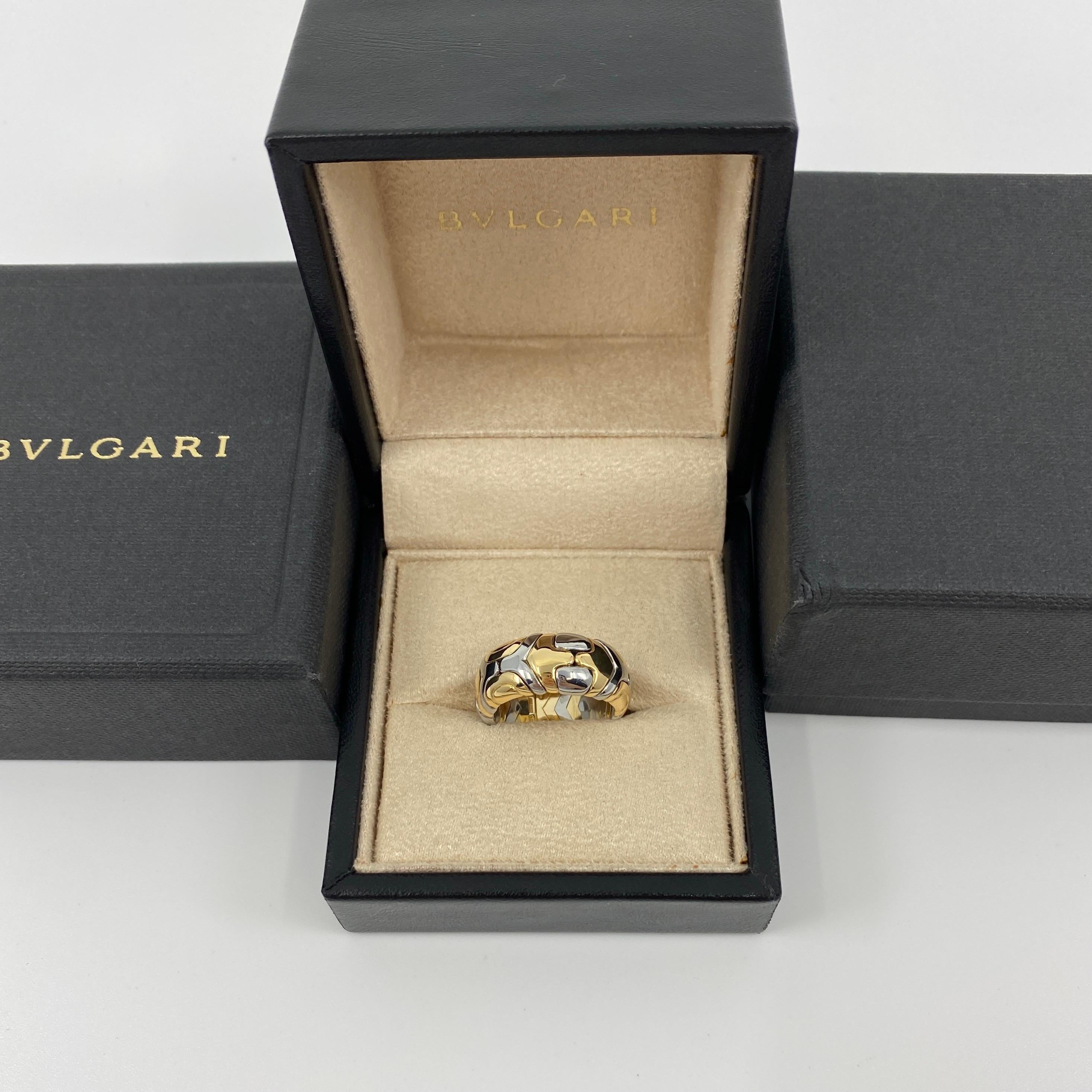 Rare Vintage Bvlgari Alveare 18k Gold & Steel Spring Wide Band Ring.

A beautiful and rare vintage 18k yellow gold and stainless steel Bvlgari Alveare ring with flexible spring design.

This stylish and unique spring design allowing it to fit