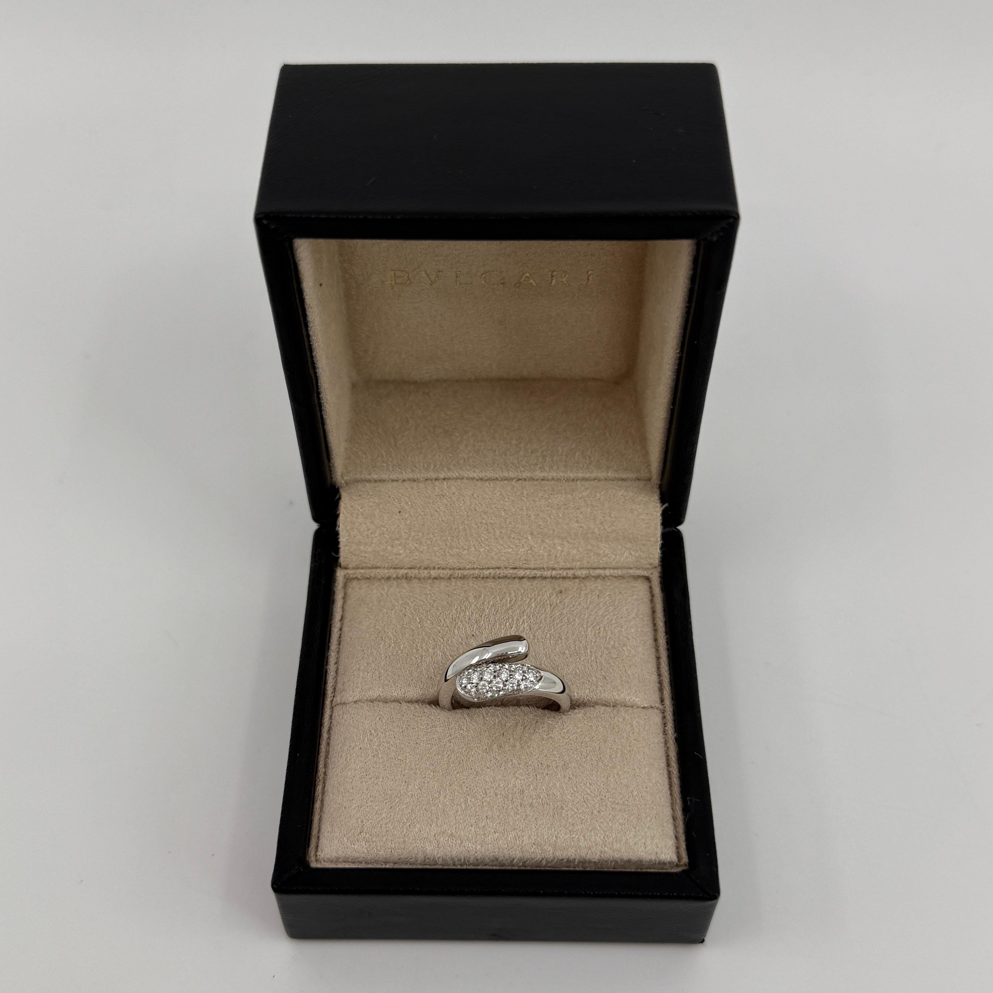 Rare Vintage Bvlgari Astrea Pavé Diamond 18k White Gold Bypass Ring.

The classic Bvlgari snake theme from the modern Astrea line, this 18k white gold bypass ring wraps beautifully around the finger.
The ring is set with top quality natural round
