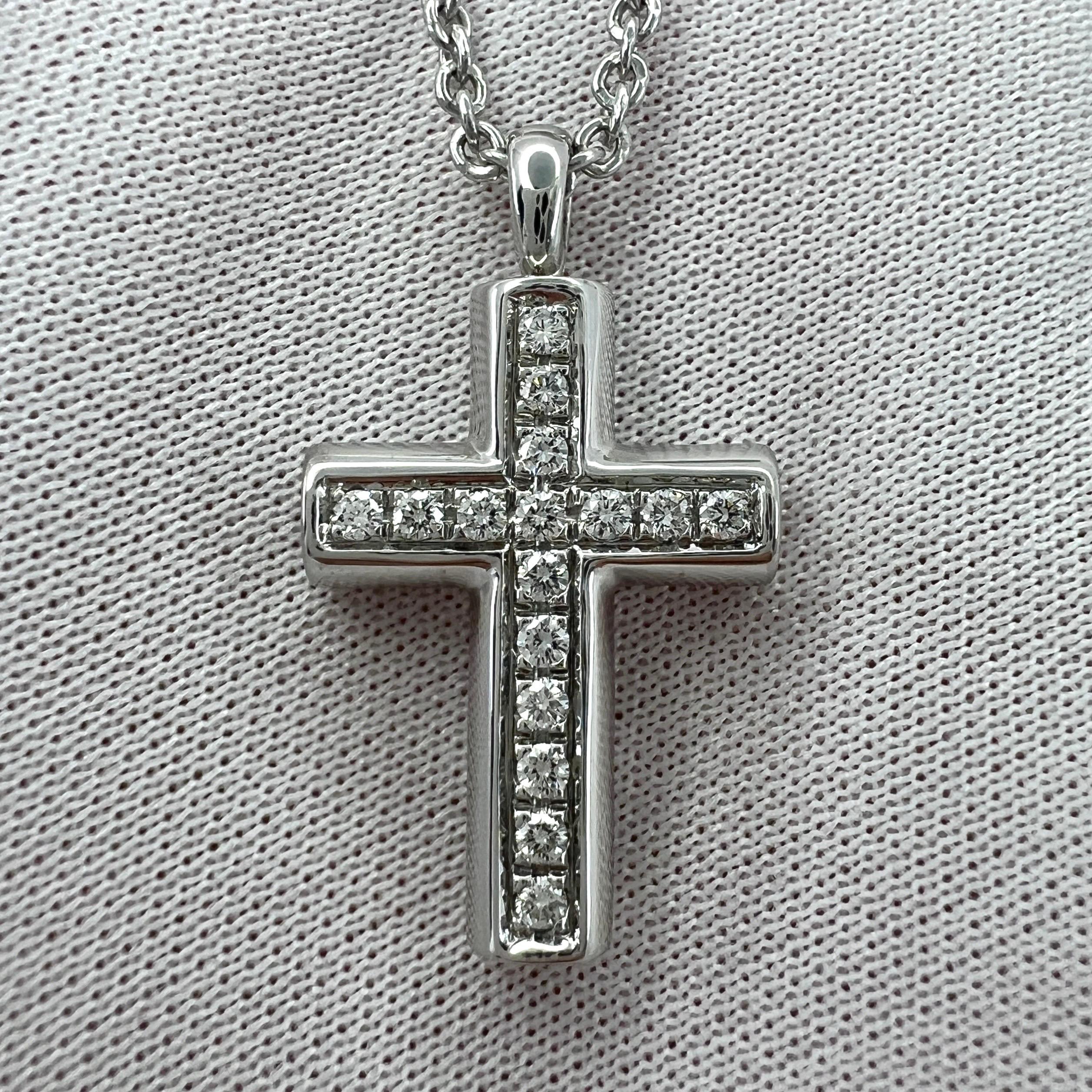 A Rare Vintage Bvlgari 18k White Gold Diamond Cross Pendant Necklace.

A beautiful Bvlgari diamond cross, set with 1.5mm round brilliant cut natural diamonds. All with an excellent cut, clarity and colour.

Fine jewellery houses like Bvlgari only