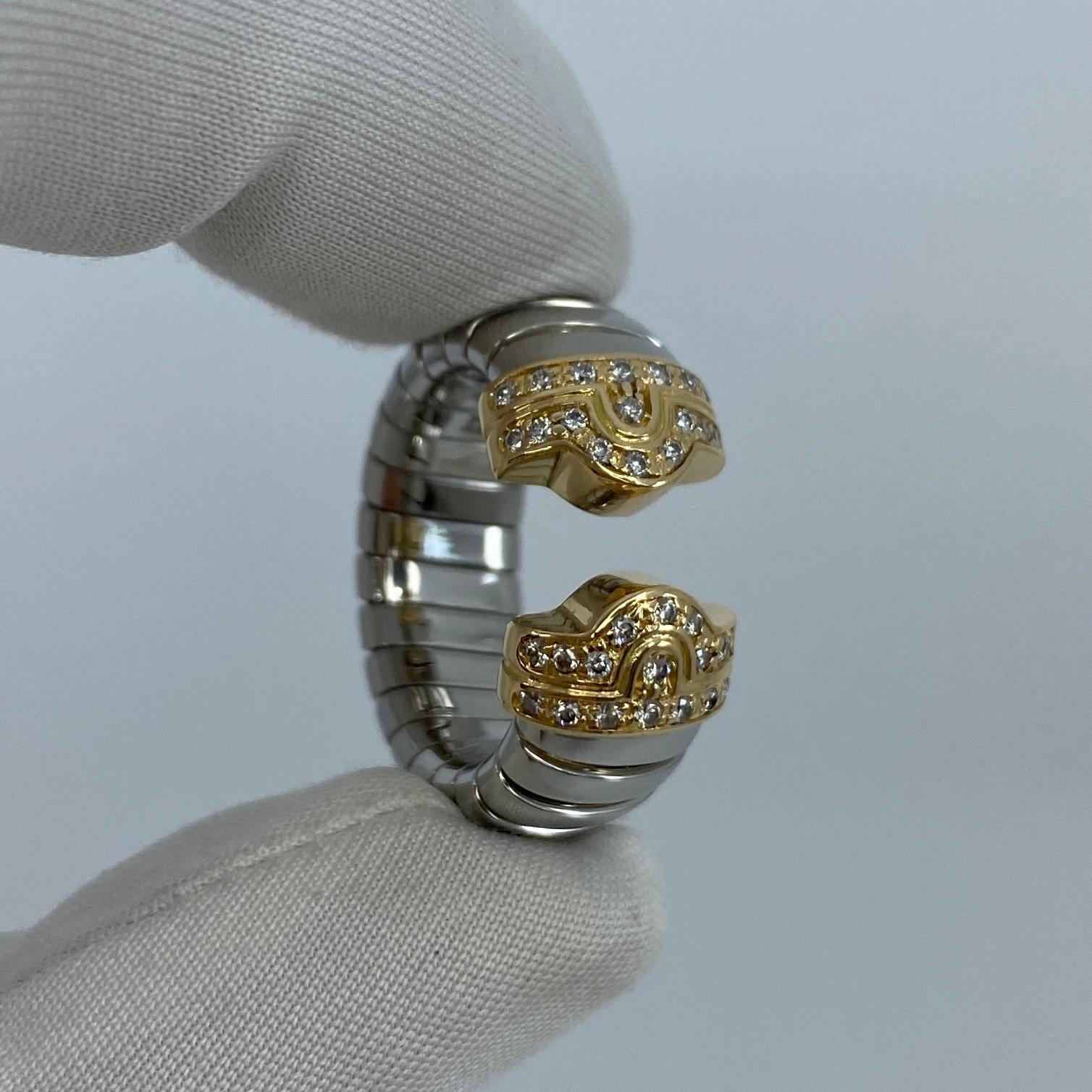 Vintage Bvlgari Diamond Parentesi 18 Karat Gold & Steel Spring Ring.

A beautiful 18k yellow gold and stainless steel Bvlgari Diamond Parentesi ring with flexible spring design.
This stylish and unique spring design allowing it to fit between L1/2