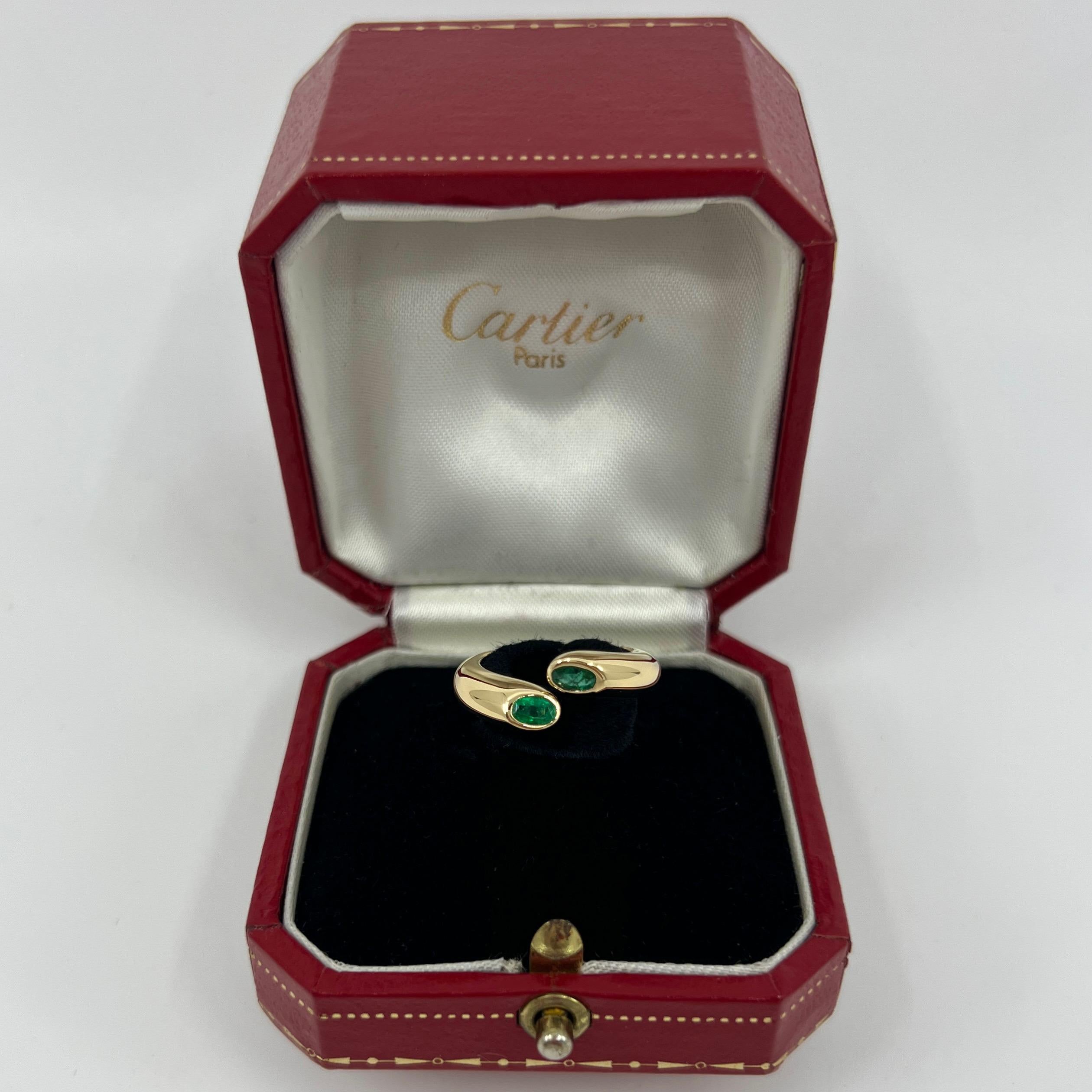 Rare Vintage Cartier Vivid Green Emerald 18k Yellow Gold Bypass Ring.

Stunning yellow gold ring set with 2 fine deep green oval cut emeralds. Fine jewellery houses like Cartier only use the finest of gemstones and these emeralds are no