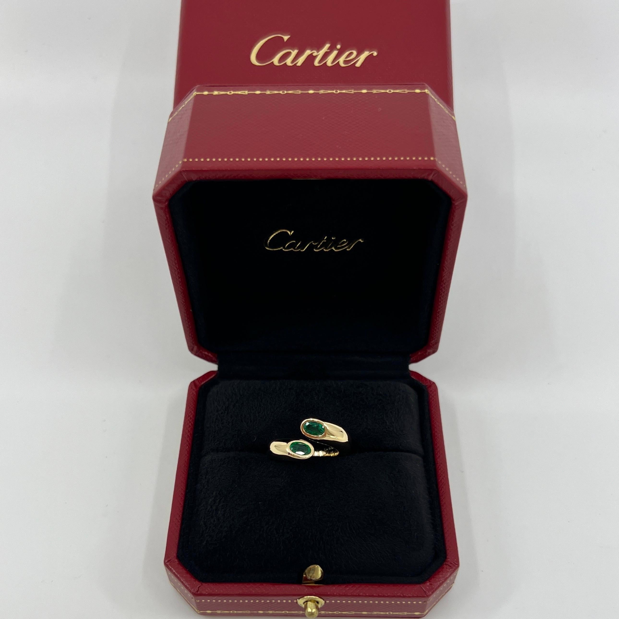 Rare Vintage Cartier Vivid Green Emerald 18k Yellow Gold Bypass Ring.

Stunning yellow gold ring set with 2 fine vivid green oval cut emeralds. Fine jewellery houses like Cartier only use the finest of gemstones and these emeralds are no