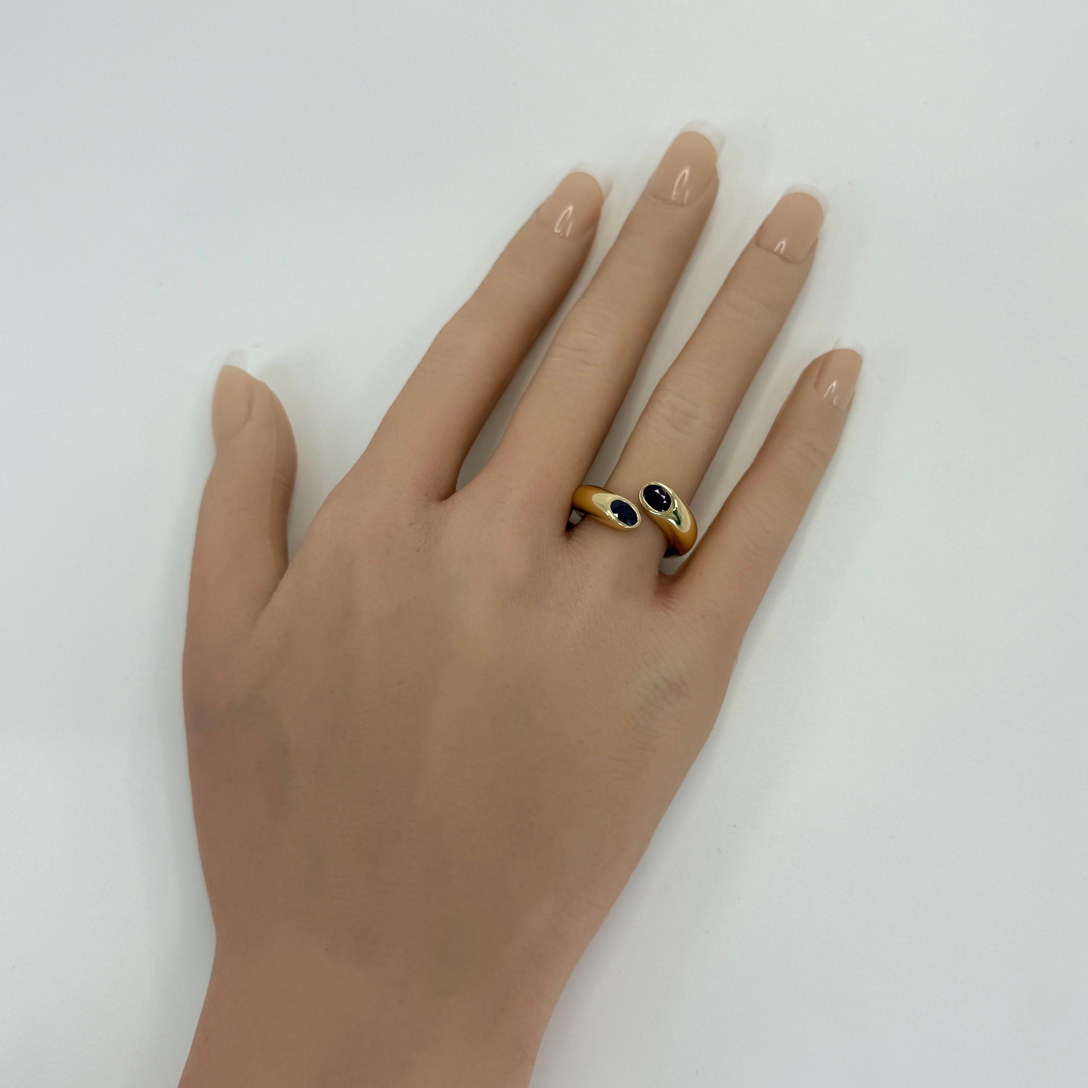 Women's or Men's Rare Vintage Cartier Large Red Ruby Ellipse Oval Cut 18k Gold Bypass Split Ring For Sale