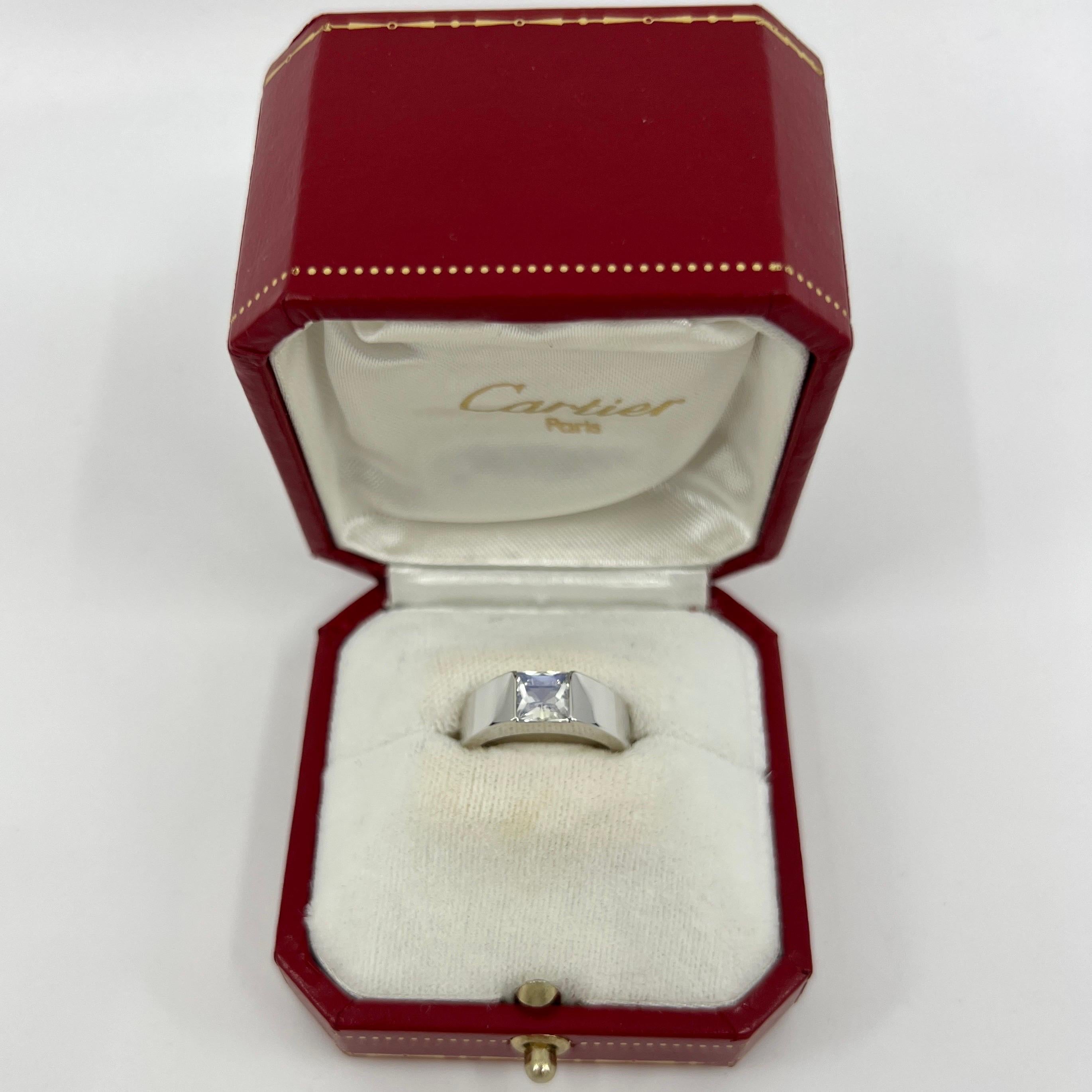 Vintage Cartier White Moonstone 18 Karat White Gold Tank Solo Ring.

Stunning white gold ring with a 6mm tension set moonstone. 
Fine jewellery houses like Cartier only use the finest of gemstones and this piece is no exception. A top grade