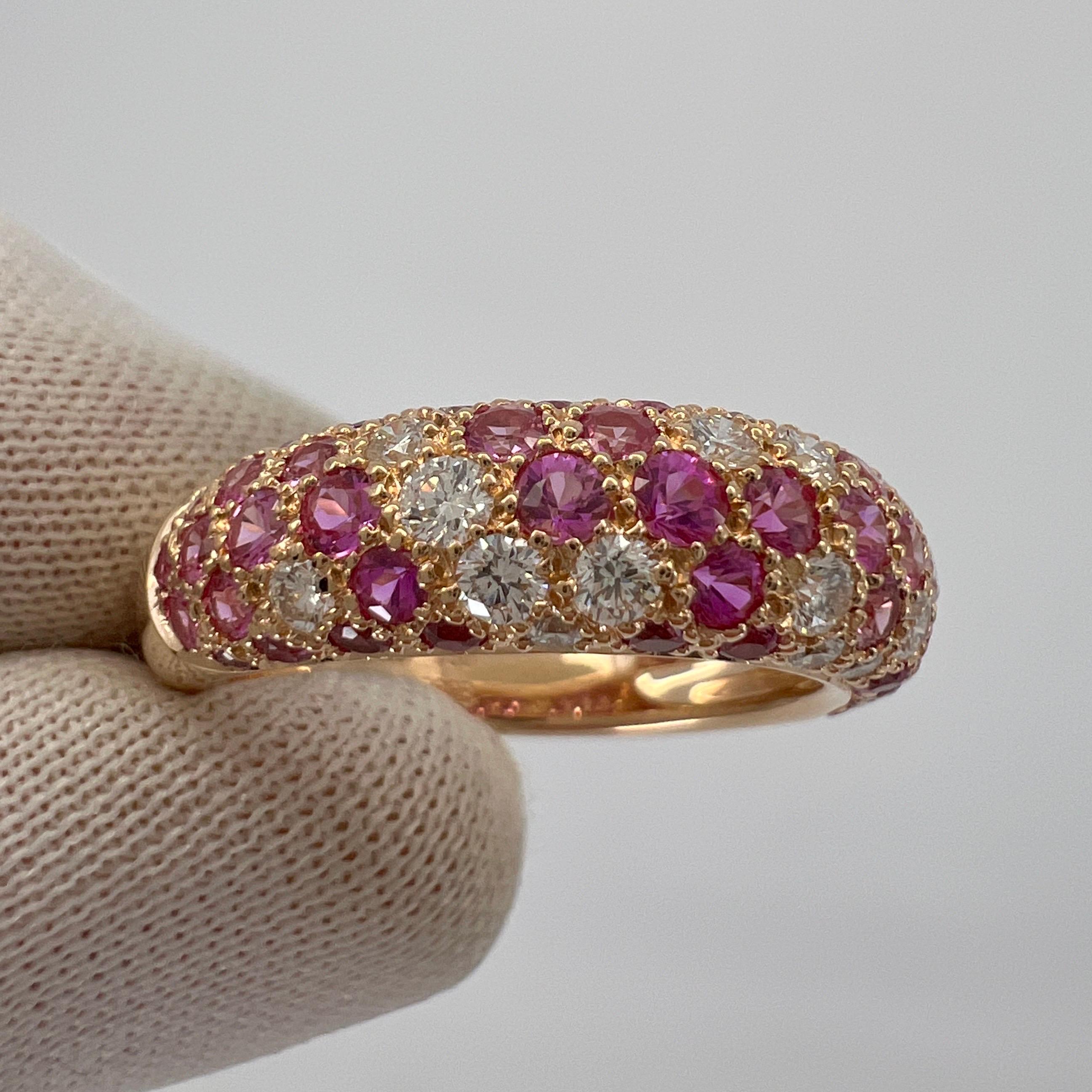 Rare Vintage Cartier Pavé Pink Sapphire & Diamond 18k Rose Gold Band Ring.

This beautifully made ring by Cartier features a curved dome design with three rows of beautifully set Pavé diamonds and pink sapphires going halfway around the band.

The