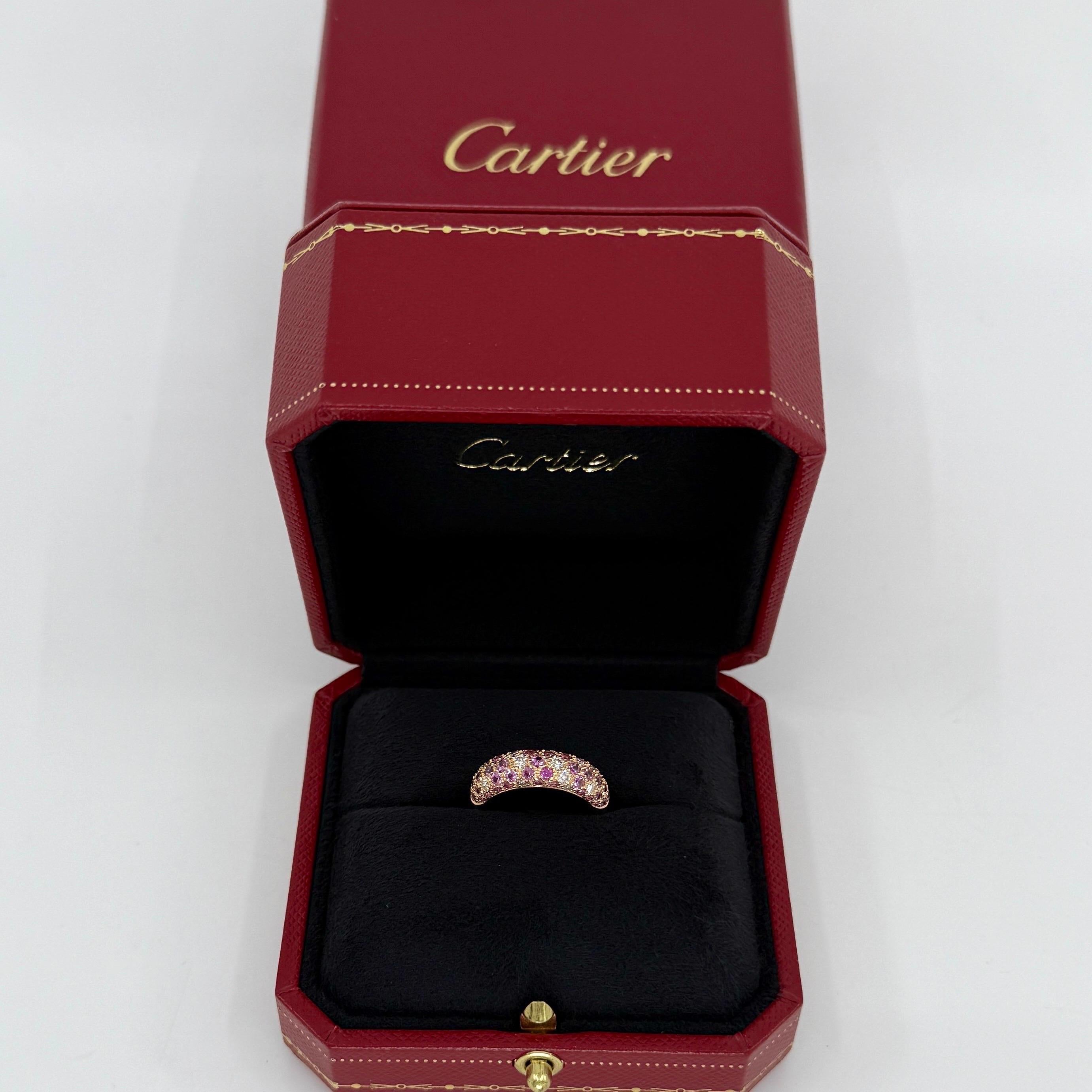Rare Vintage Cartier Pavé Pink Sapphire & Diamond 18k Rose Gold Band Ring.

This beautifully made ring by Cartier features a curved dome design with three rows of beautifully set Pavé diamonds and pink sapphires going halfway around the band.

The