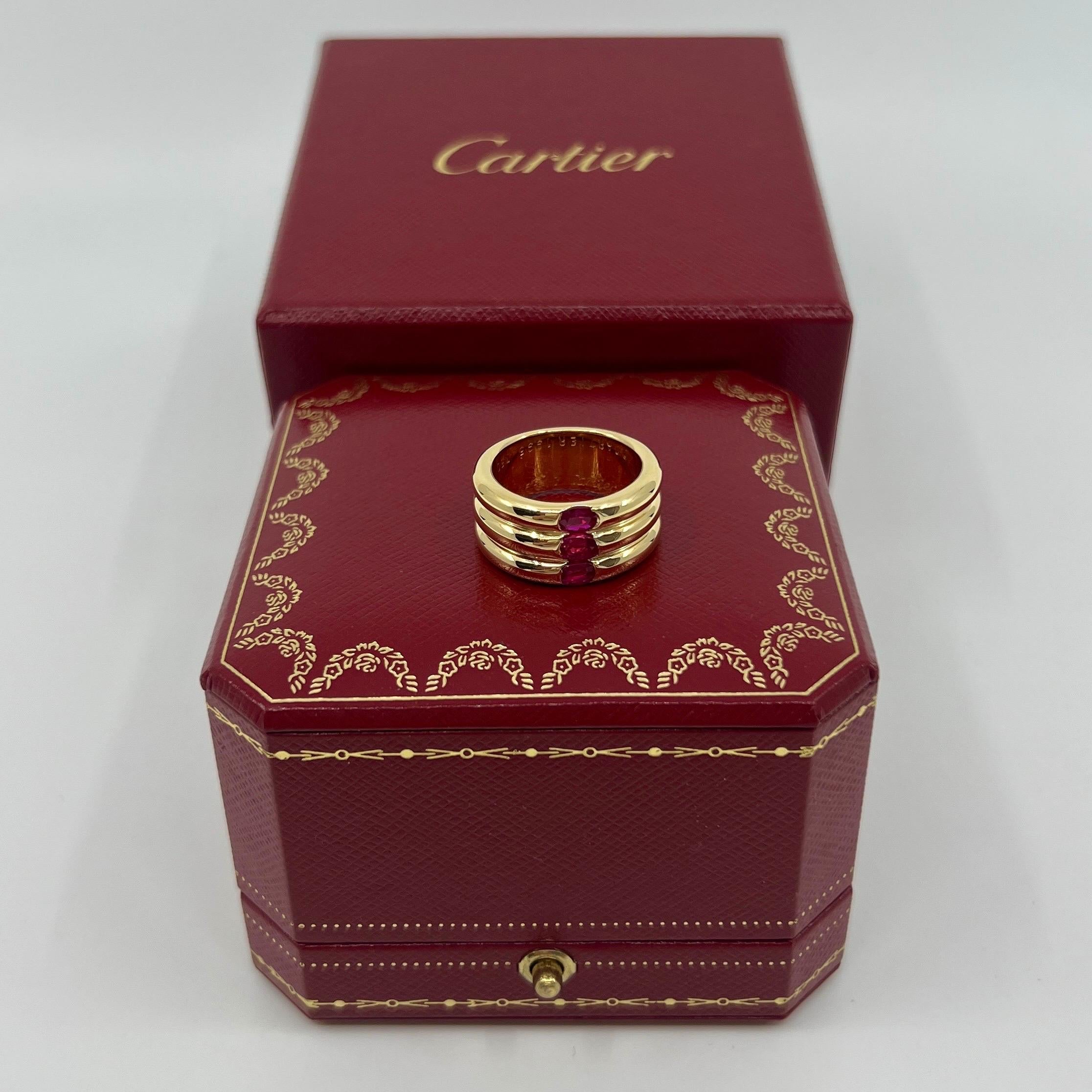 Oval Cut Rare Vintage Cartier Red Ruby Ellipse 18k Yellow Gold Three Stone Band Ring 53 For Sale