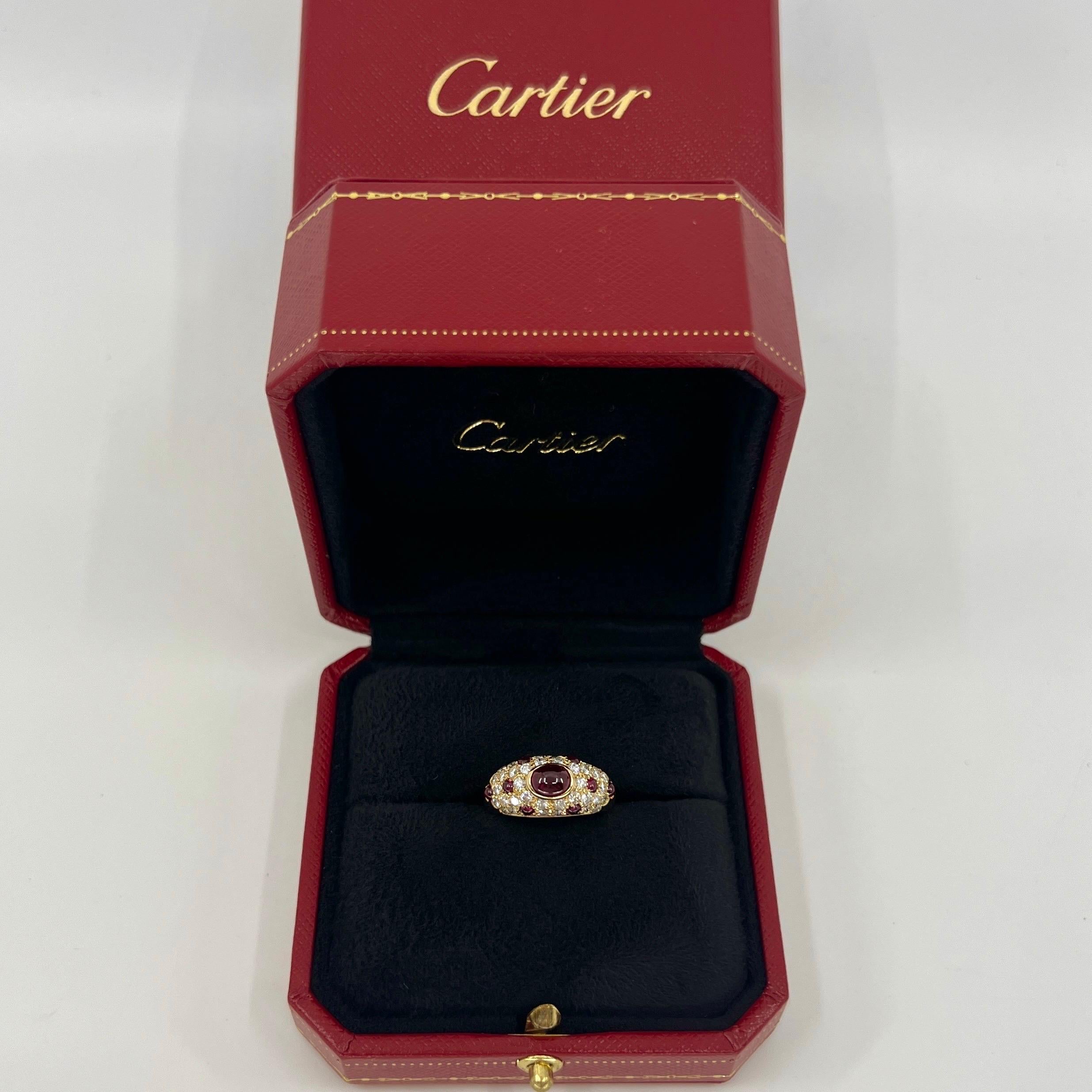 Vintage Cartier Ruby And Diamond 18k Yellow Gold Mimi Dome Ring.

A very rare yellow gold Cartier ring set with a top grade ruby with a deep red colour and excellent oval cabochon cut. Measures 7.3x5.7mm in bezel. Approx. 1.2 Carat. The ruby has