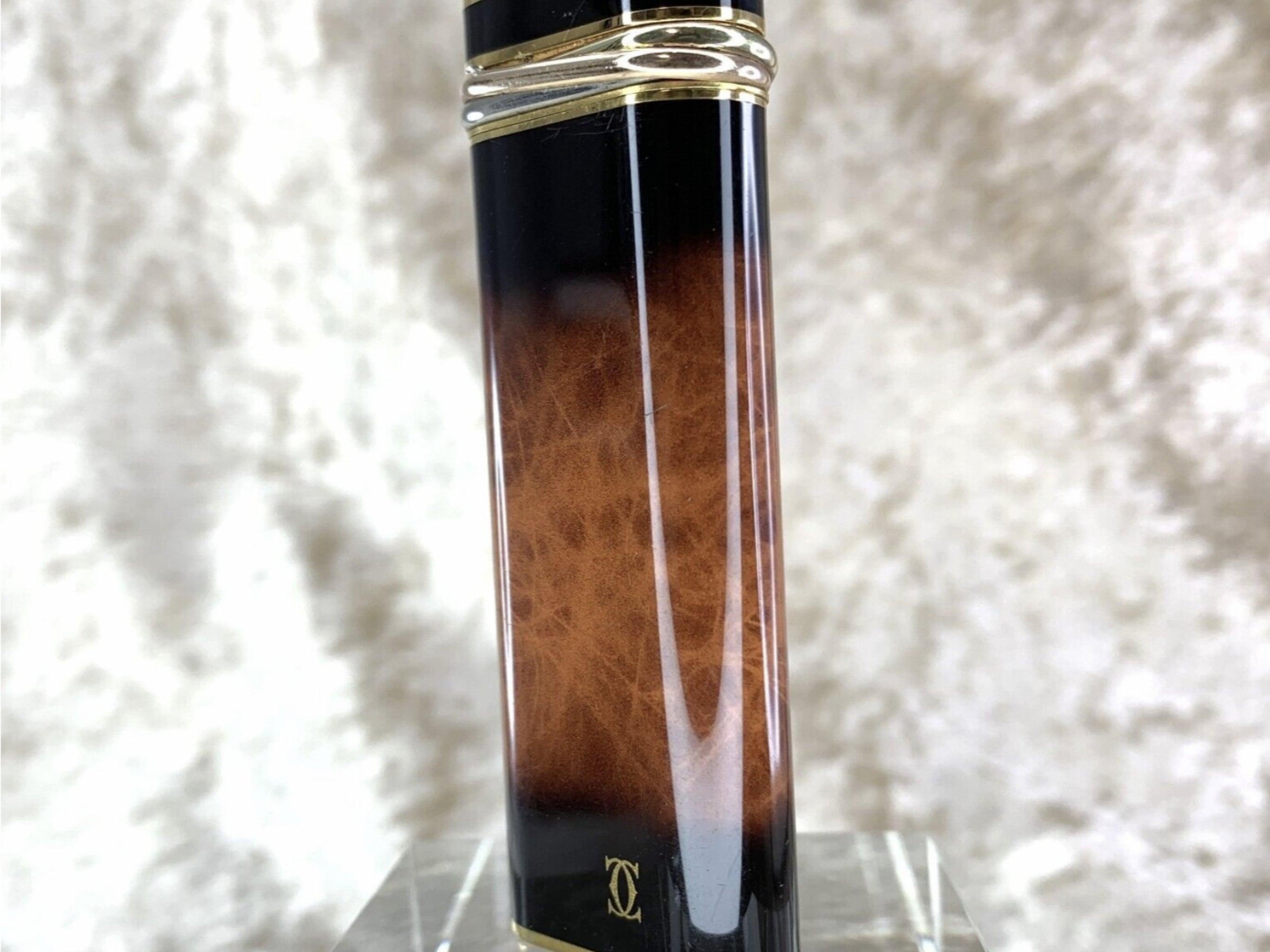 Women's or Men's Cartier Circa 80s Vintage “Trinity” Brown Flame Lacquer 18k Gold Plated Lighter For Sale