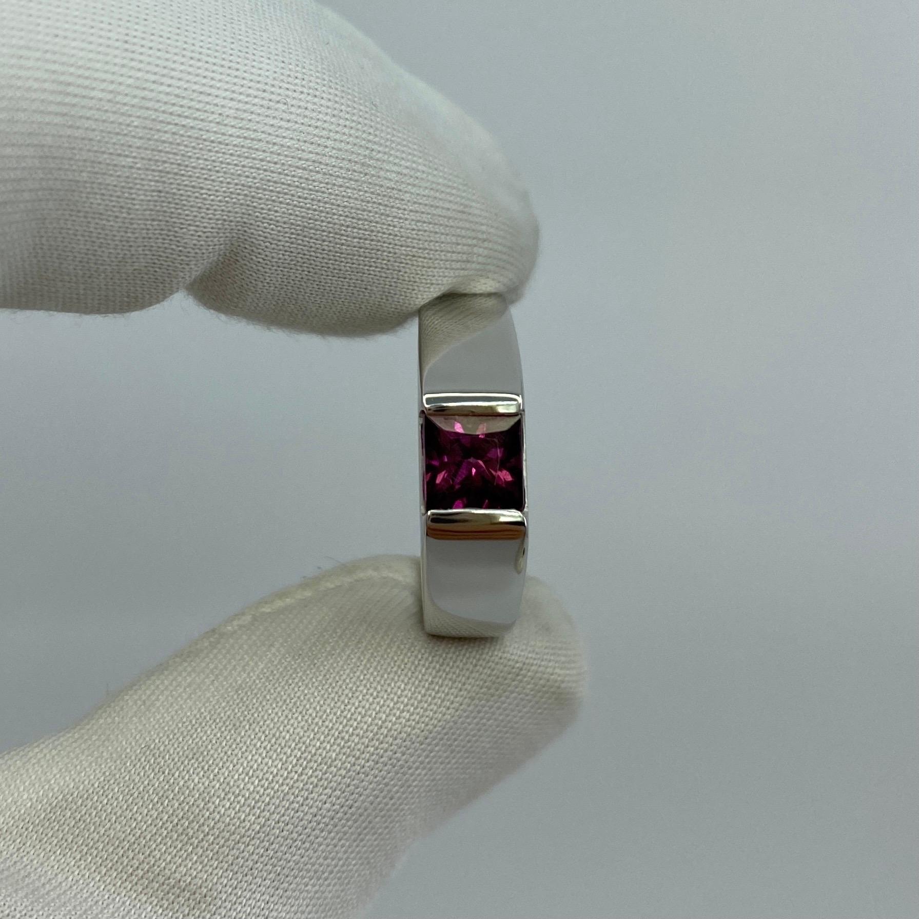 Vintage Cartier Pink Purple Rhodolite Garnet 18 Karat White Gold Tank Ring.

Stunning white gold ring with a 5mm tension set bright pink fancy-cut rhodolite garnet. Fine jewellery houses like Cartier only use the finest of gemstones and this garnet