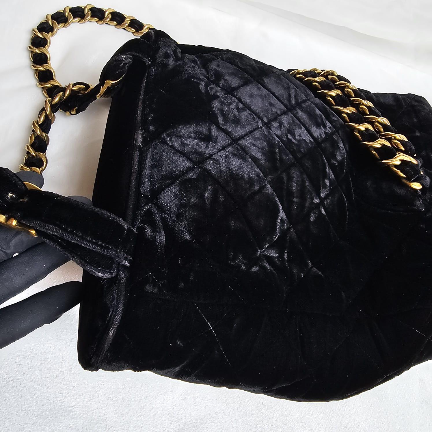 Rare Chanel small duma backpack in black velvet with gold hardware. Minimal rubbing on the velvet surface, but pretty visible on few spots. Slight creaking on the turnlock. Hologram sticker has rubbed off, but comes with card. Series #3. Comes with