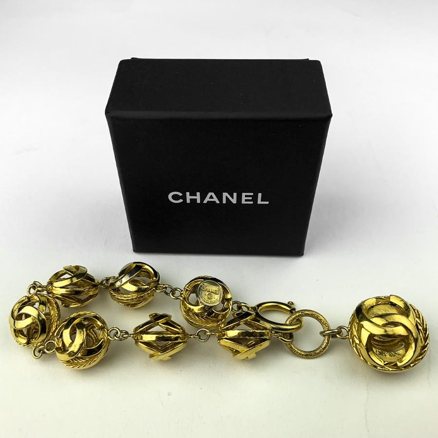 Rare vintage Chanel bracelet. Has been done between 1970-1980. Gold toned, in very good condition. Length: 22 cm. Diameter of a sphere is 2 cm, and the charm is 3 cm. Made In France. Will be delivered in its box. 