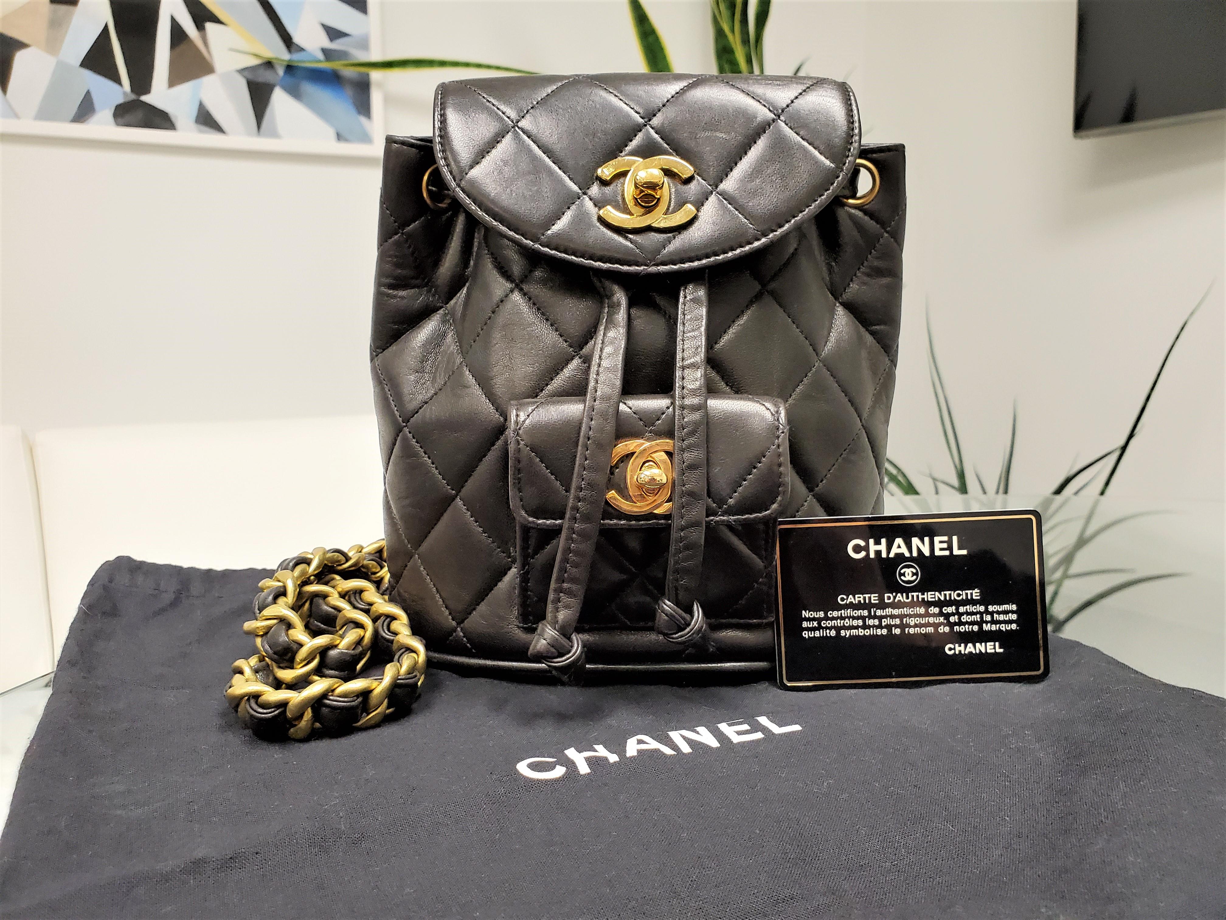 Brand - Chanel
Collection - Duma
Primary Material - Black quilted lambskin leather
Hardware - Antique goldtone
Pockets - One small exterior flap pocket
Interior - Black lambskin leather
Strap - Extra thick CC gold backpack chains with leather
Origin