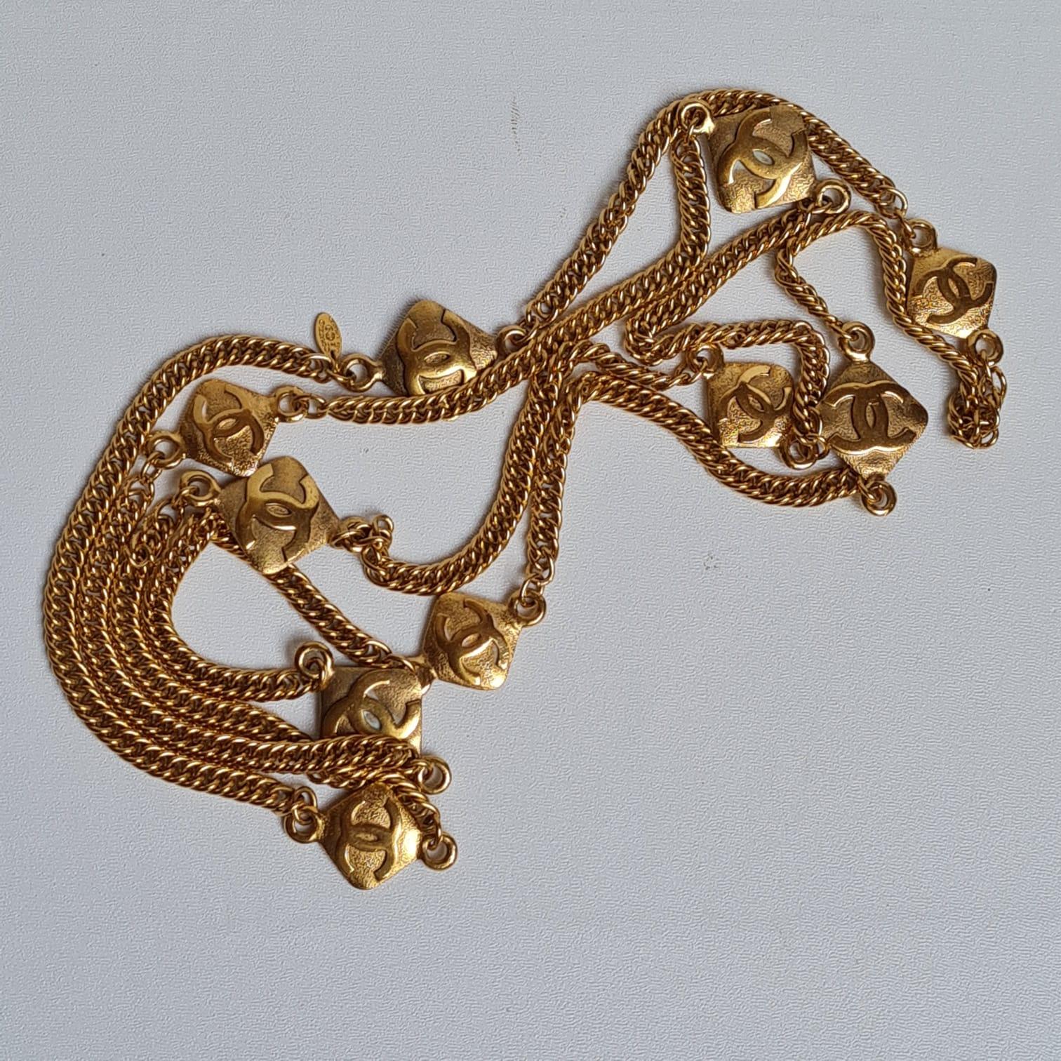 Rare gold layered necklace with diamond shaped CC detailed. Still in beautiful condition, minor white tarnish marks thats still cleanable. Overall still in great vintage condition. Great staple piece. Comes with replacement box.