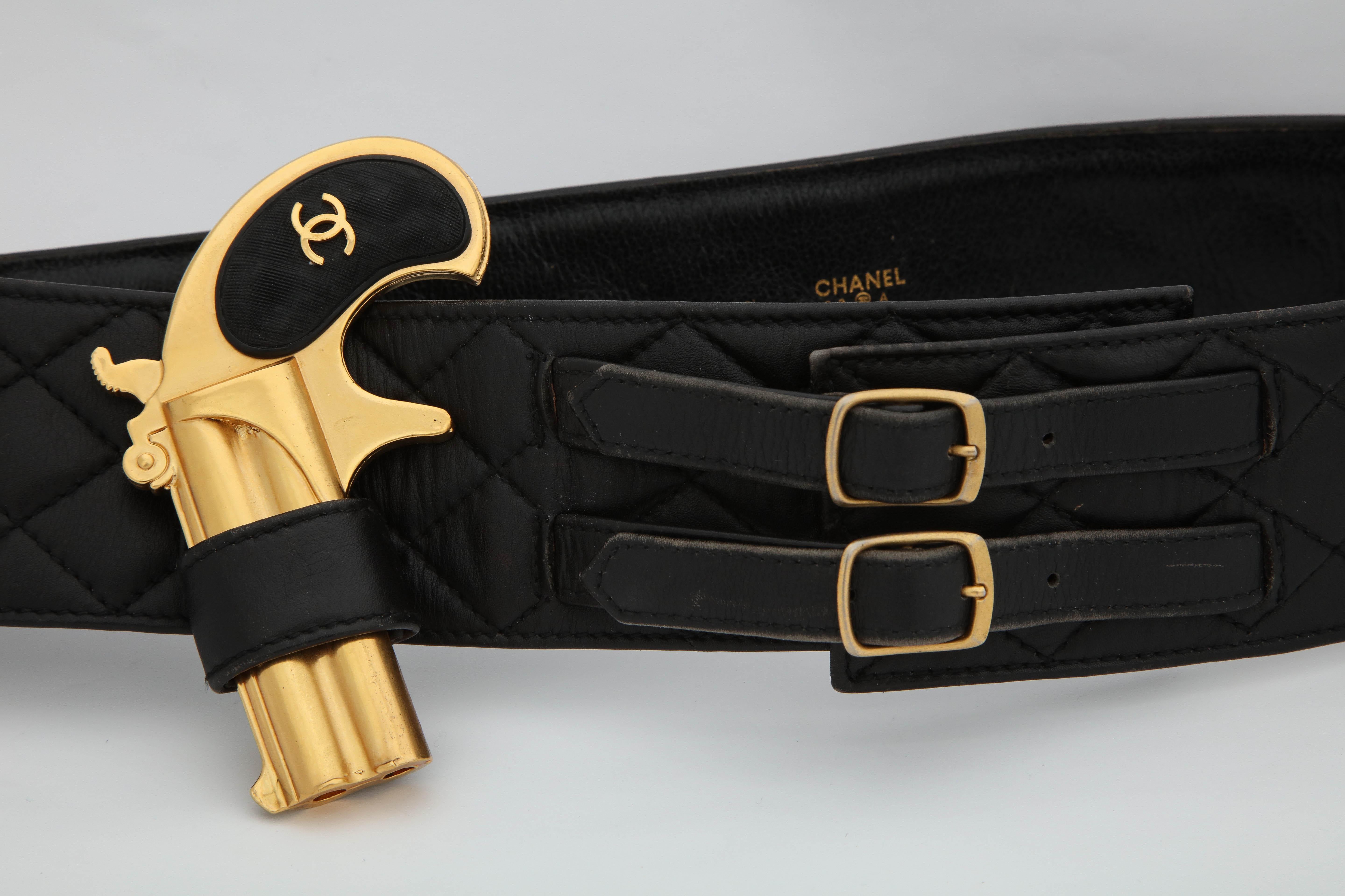 Extremely rare, collectible vintage Chanel leather holster belt with a detouchable gun. Collectors’ item.
From 1993 collection.

Size Waist 90cm