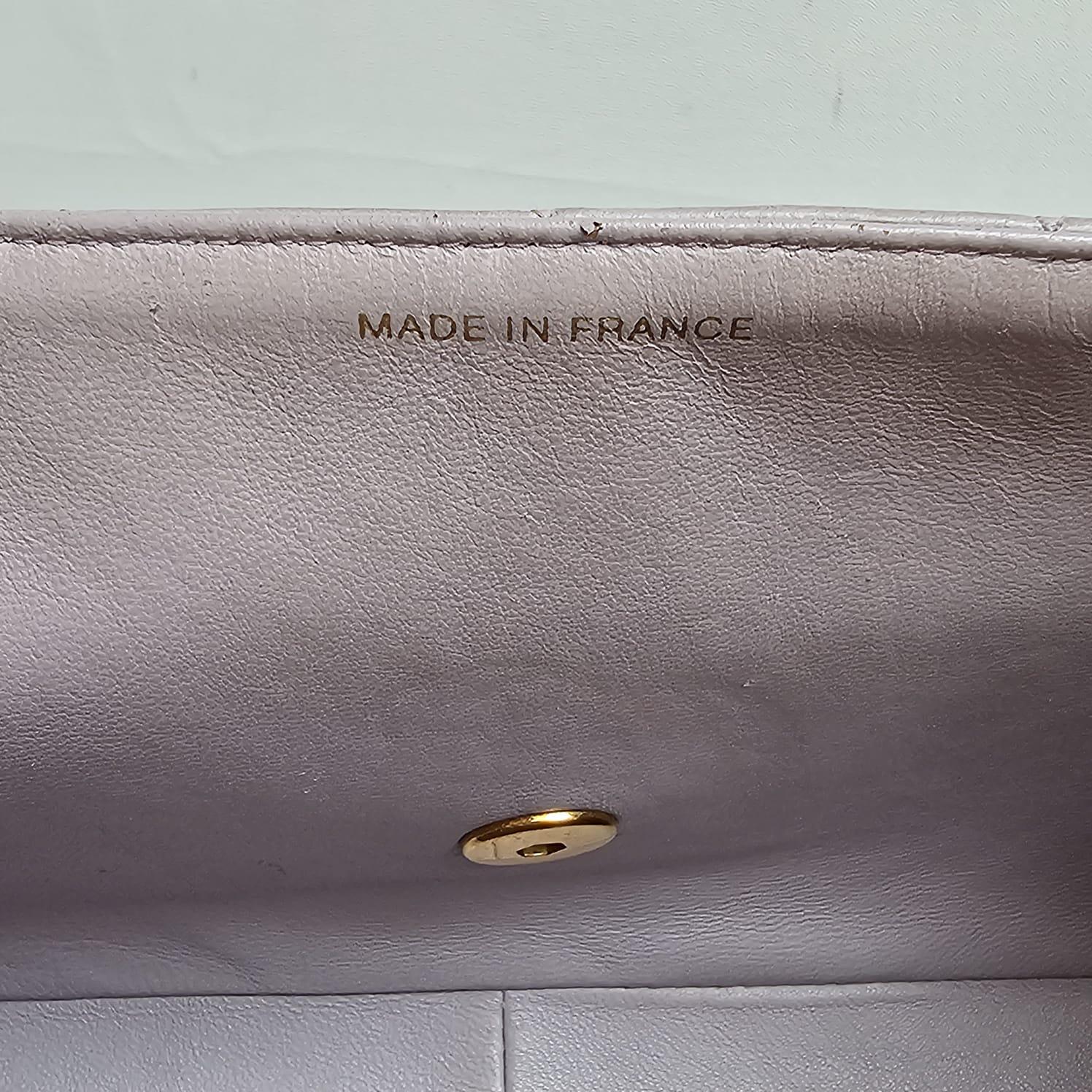 Rare diana bag in lilac color with gold hardware. Great condition overall with light creasing and rubbing marks on the corners. Overall in good vintage condition. Series #4. Comes with its card and holo sticker.