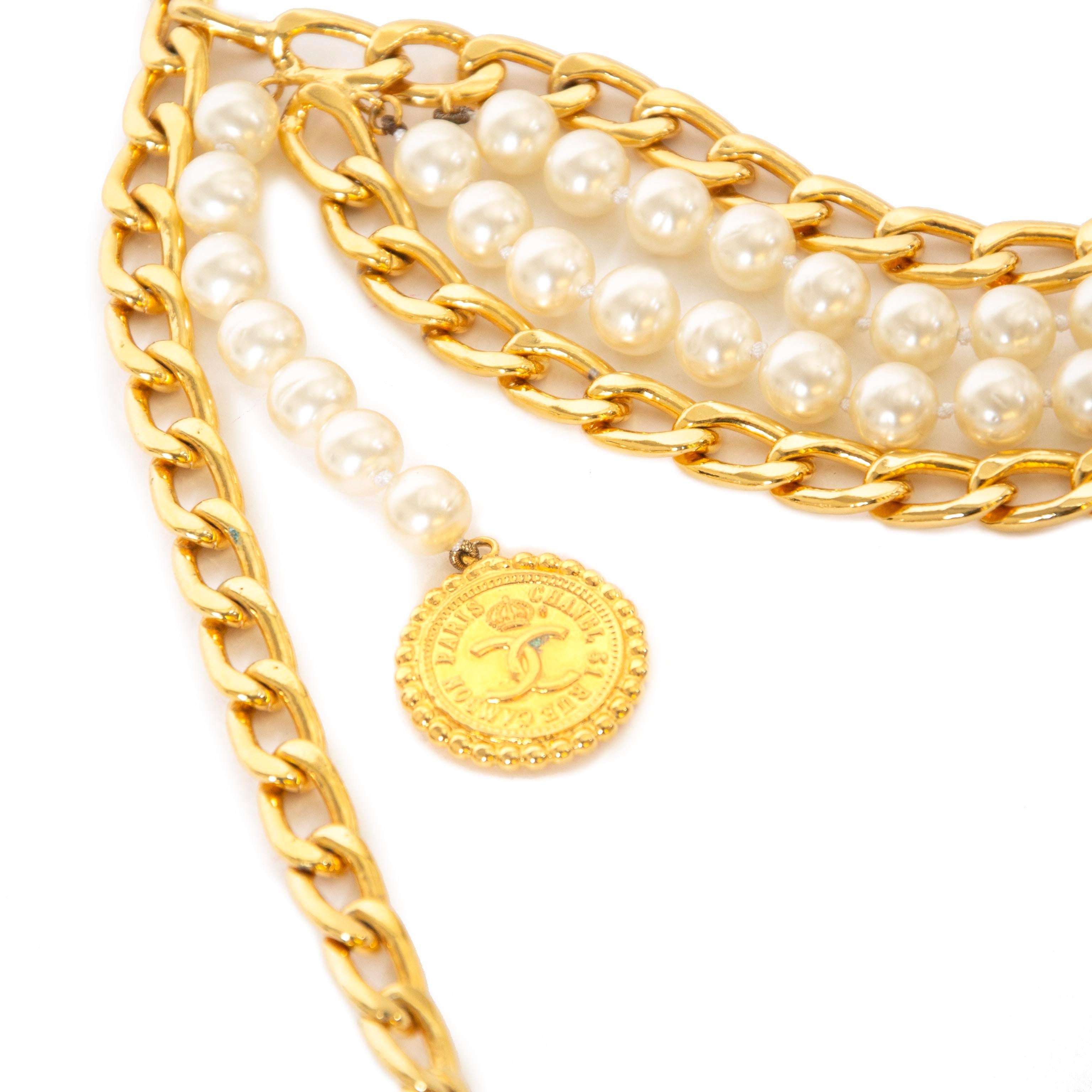 Very good condition

Rare Vintage Chanel Pearl Tassel Chain Belt

Make a statement everywhere you go with this rare Chanel belt!
The belt features gold-toned chains, pearls and a tassel. It also has a gold-toned coin with Chanel 'CC' logo.

Comes