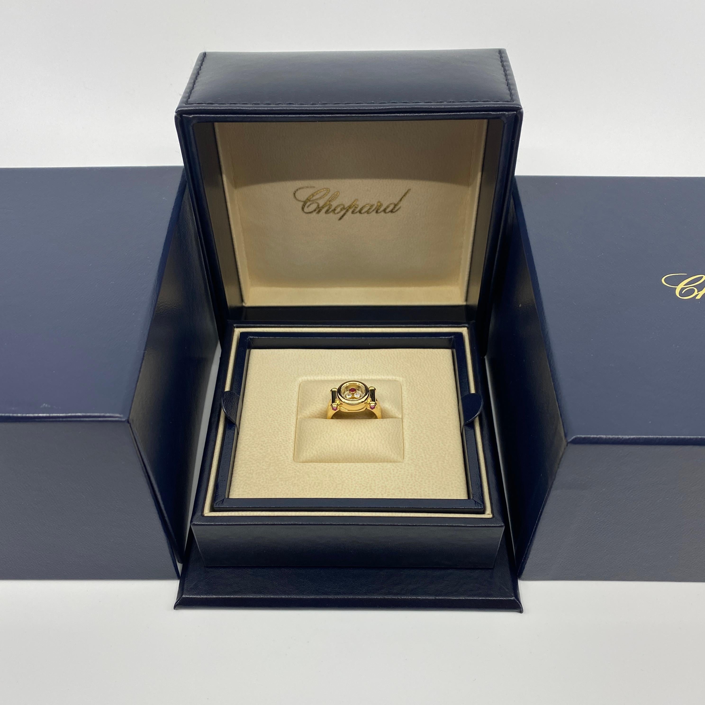 A Rare Chopard Happy Diamond Ruby 18k Yellow Gold Ring. 

Inspired by drops of water, Chopard's Happy Diamonds Icon collection features diamonds that are free to swirl gracefully behind sapphire crystal glass, enhancing their sparkle with every