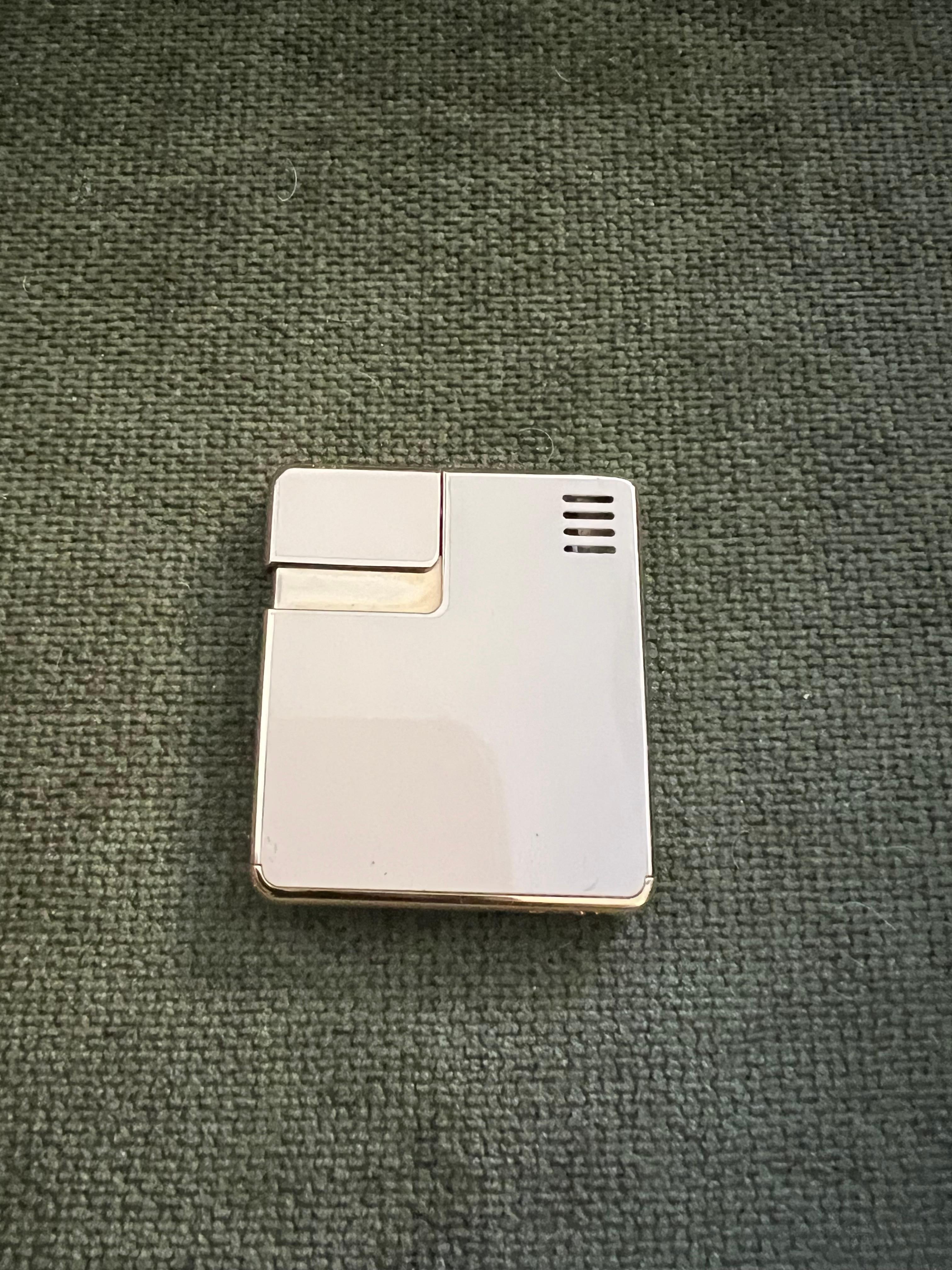 Rare Vintage Circa 1980s Logo Gucci Lighter In 18K Gold Plating & Cream Enamel 10
