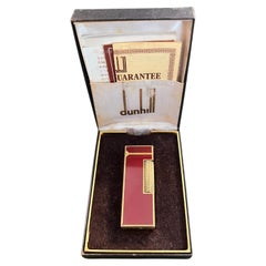 Raro accendino d'epoca Dunhill placcato in oro e lacca rossa con custodia originale in velluto