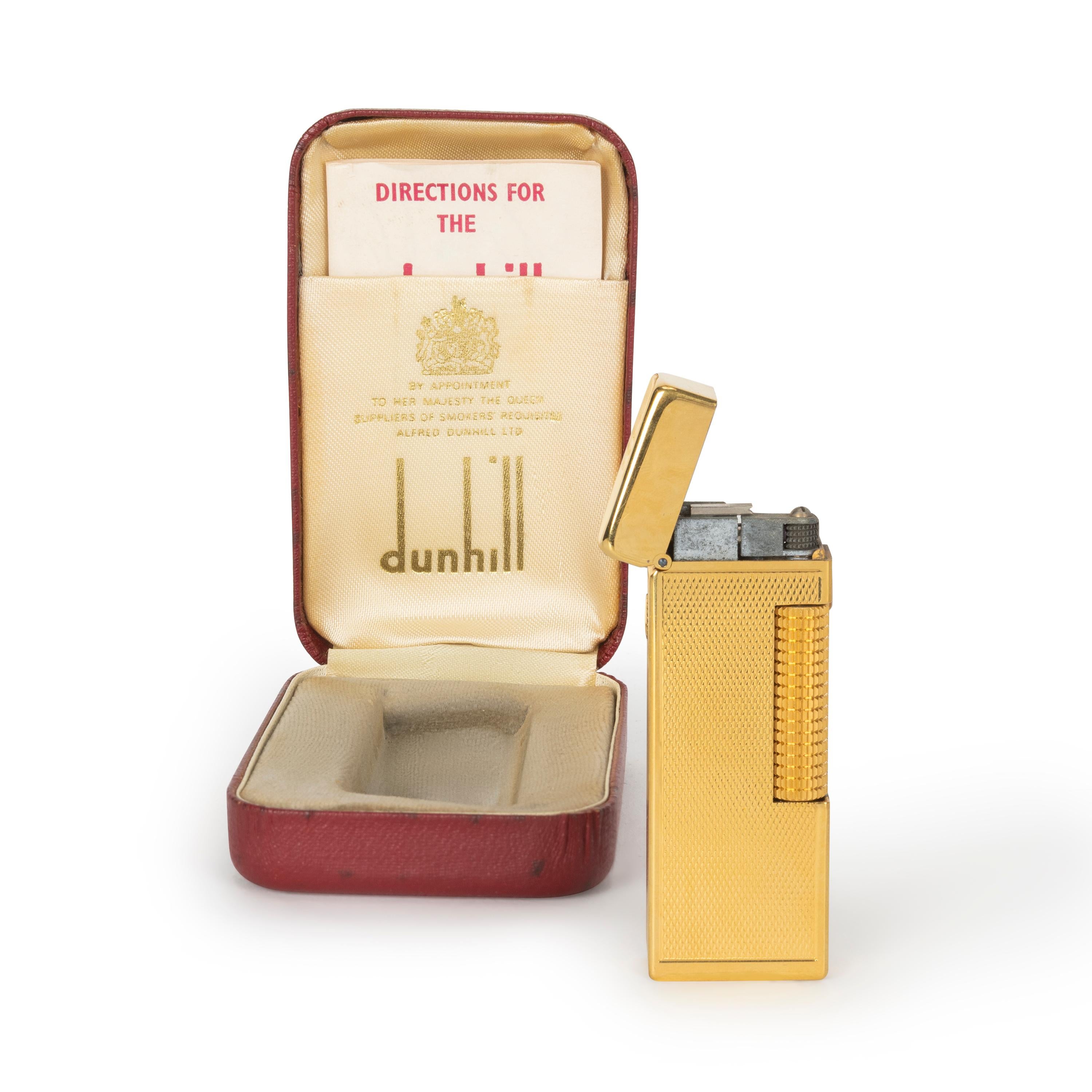 Vintage Dunhill Gold-Plated, Swiss Manufactured, Rollagas Lighter in mint condition. 
In original box. 
Brand: Dunhill.
Model: Rollagas.
Color: Gold.
Measures: 63cm x 23cm x 12cm.
.Weight: 71g.
Made in Switzerland.
Comes in original box. 