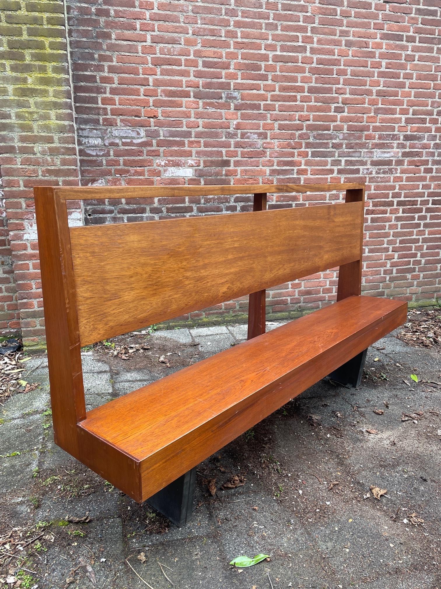 What a beauty! This unique bench is made for in a church. But is now an absolute eyecatcher for every home, restaurant or hotel. Ca Stand against the wall or free, so you can use the bakelite coat hangers at the back. This bench is also ideal for in