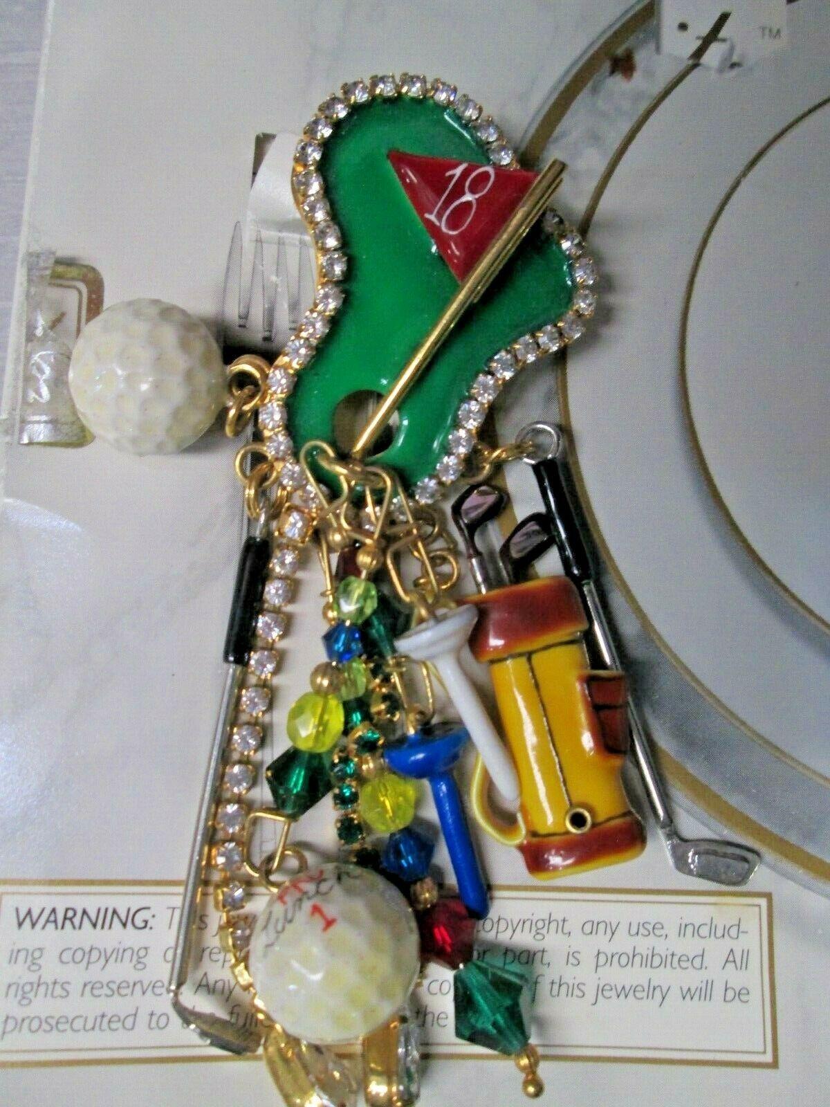 Simply Awesome! Large Enamel Multi Charm 18th Hole Golf Themed Designer Brooch signed: LUNCH AT THE RITZ. This “Golf Enthusiast” Brooch epitomizes Vintage charm with personality! Measuring approx. 4” long. More Beautiful in real time! Sure to be