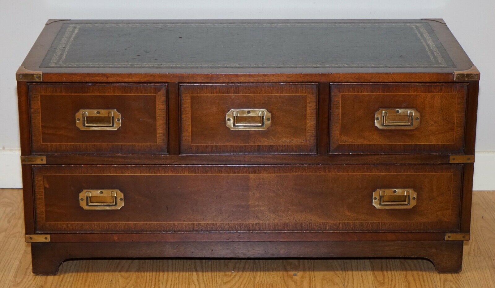 We are delighted to sell this rare vintage military campaign low chest of drawers.

A very well made and decorative low chest, it's Vintage circa the 1940s. It has all the original campaign handles, this desk is of real quality.

We have lightly