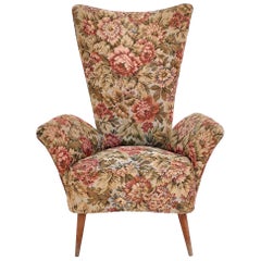 Rara poltrona vintage in tessuto floreale per bambini con gambe in legno, Italia