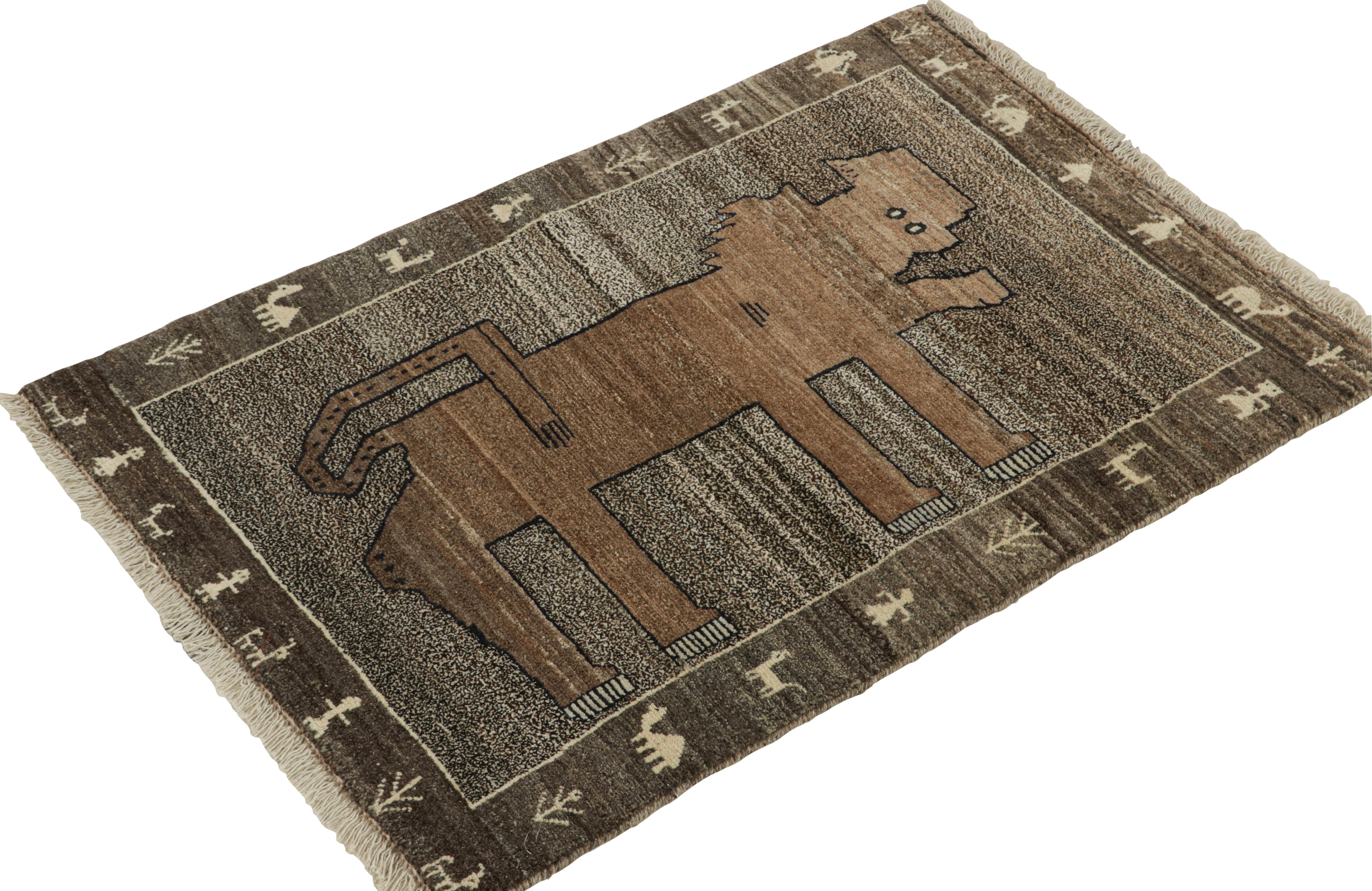 This vintage 3x5 Gabbeh Persian rug is from the latest entries in Rug & Kilim’s rare tribal curations. Hand-knotted in wool circa 1950-1960.

On the Design:

This tribal provenance is one of the most primitive, and collectible shabby-chic styles