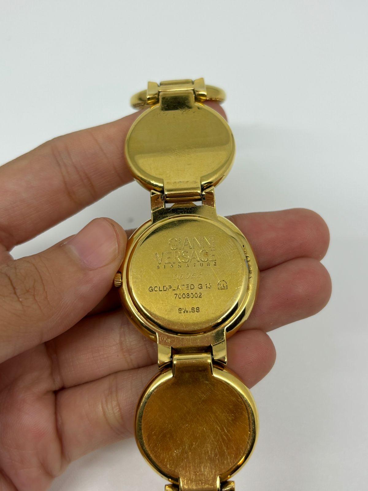 Rare Vintage Gianni Versace Gold Plated Medusa Gold Coin Black Dial Wrist Watch For Sale 7