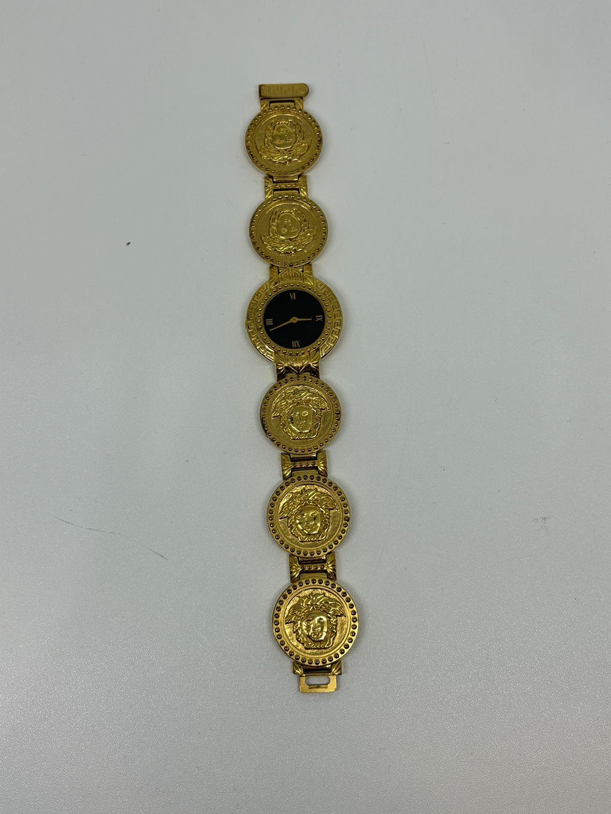 Rare Vintage Gianni Versace Gold Plated Medusa Gold Coin Black Dial Wrist Watch In Good Condition For Sale In Jakarta, Daerah Khusus Ibukota Jakarta