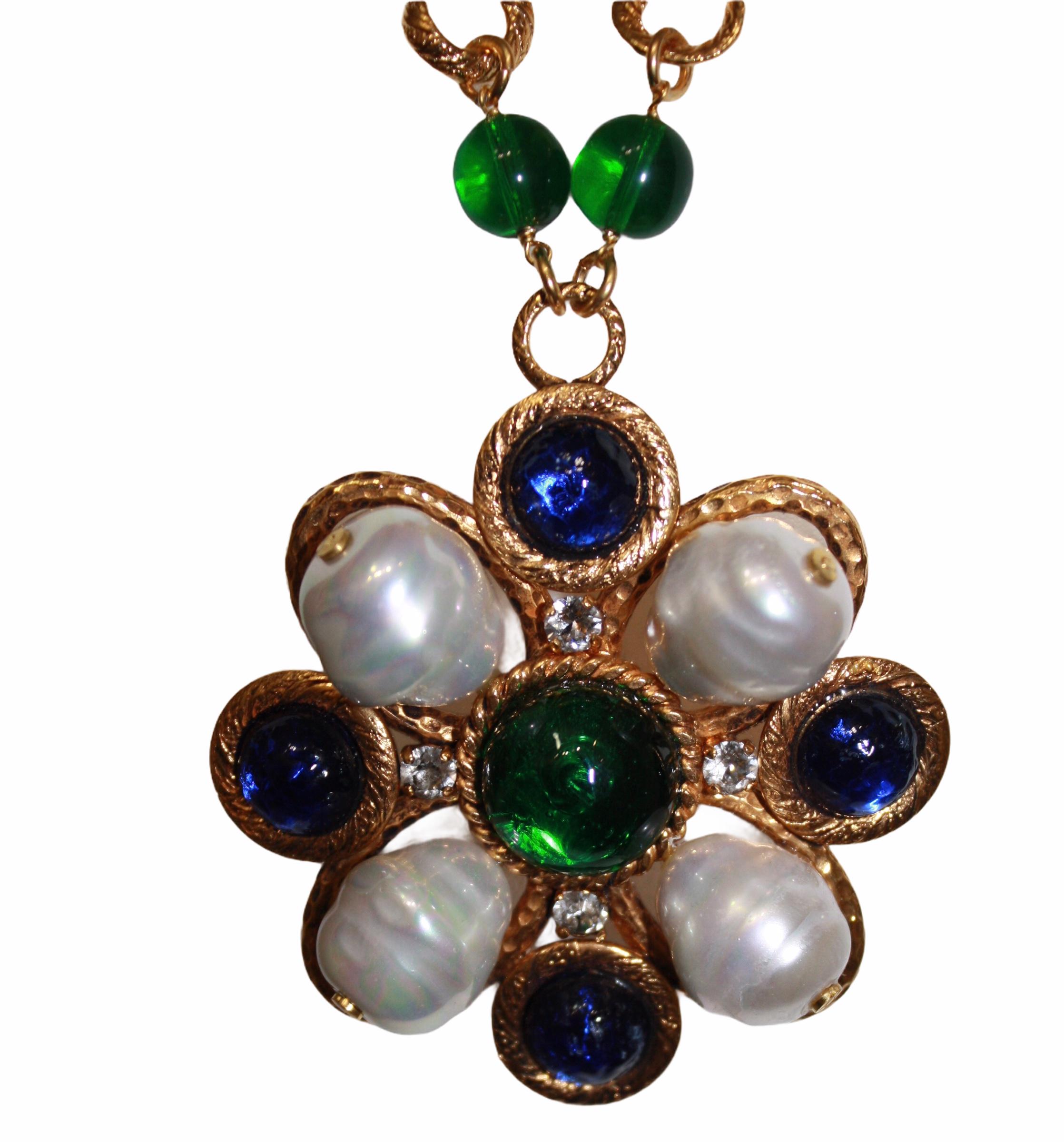 Vintage necklace circa 1990. Pate de verre process by Gripoix in blue and green. Handmade glass pearls. Chain is 18-carat gilded brass.
Pendant is 2.75