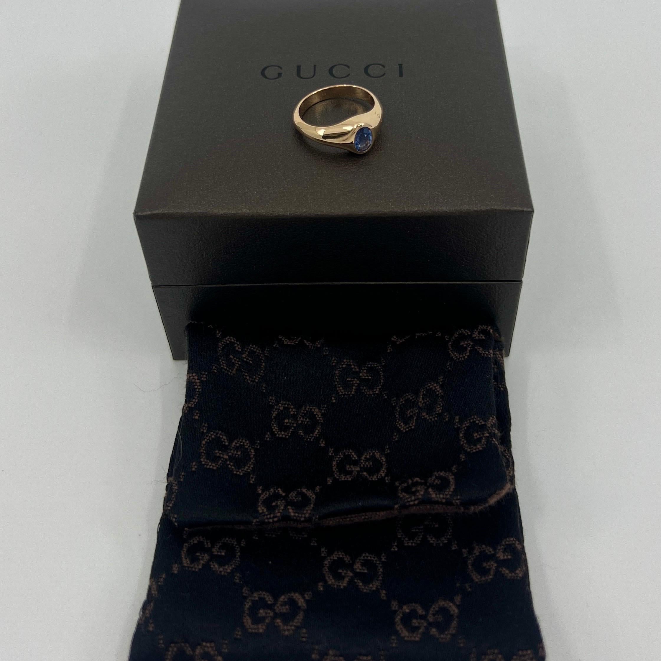 Vintage Gucci Oval Cut Blue Sapphire 18k Yellow Gold Signet Ring.

6x4mm natural sapphire with a vivid light blue colour beautifully rubover bezel set in a fine 18k yellow gold signet style ring.

The ring has Gucci engraved onto the side. 
Also