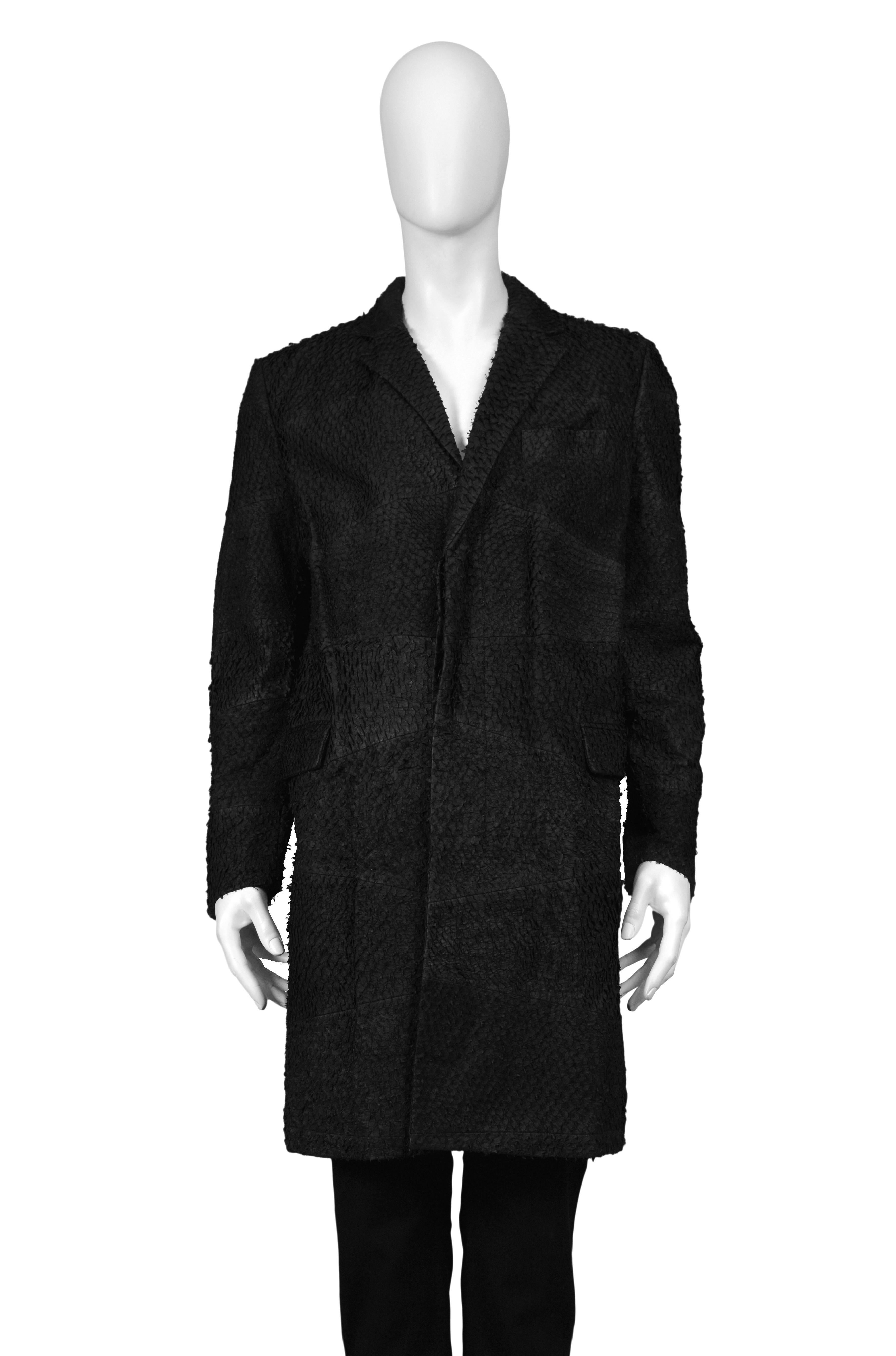 HELMUT LANG

BLACK PERCH LEATHER CLASSIC COAT
Condition : Excellent Vintage Condition
Helmut Lang black leather over coat with rough texture finish.

Press sample. Never worn. Comes with press sticker and original tag.
Size 50
ARTIFACTS: Helmut Lang