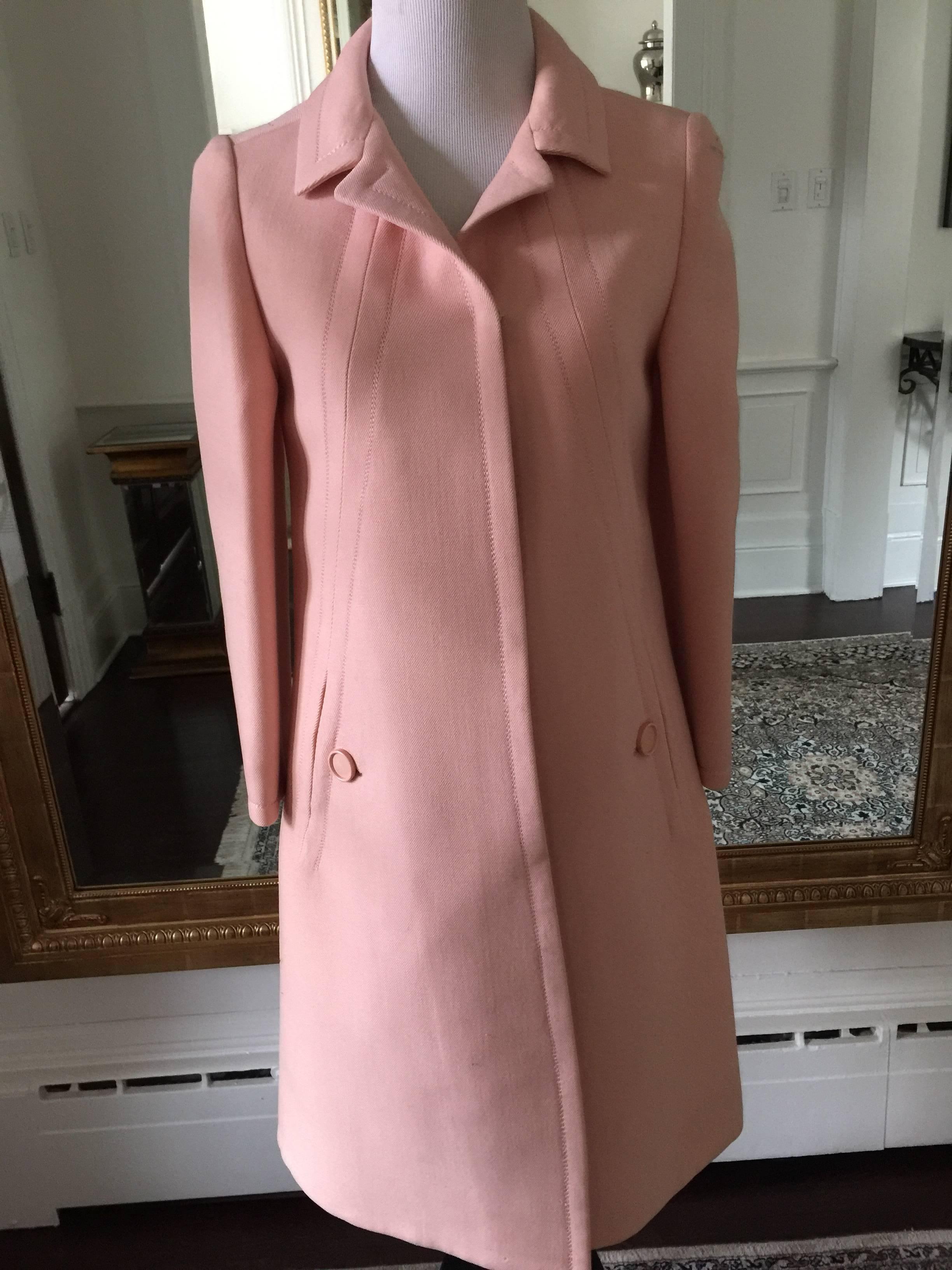  Rare Gorgeous Pink Jean Patou wool coat.  Elegant and timeless in the softest pink colour.
Jacky O style... stiching all along the back.
This coat really shows off Jean Patou master craftsmanship