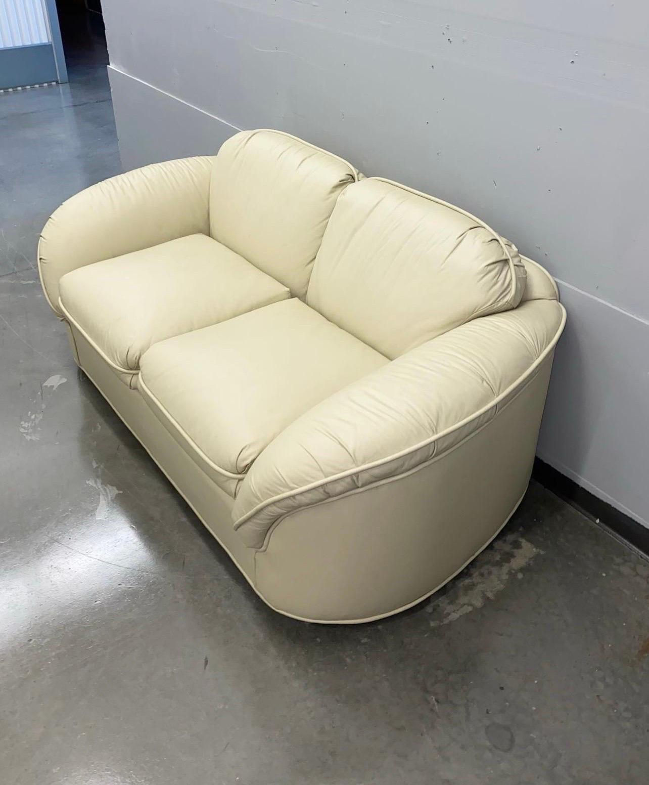 cream leather loveseat