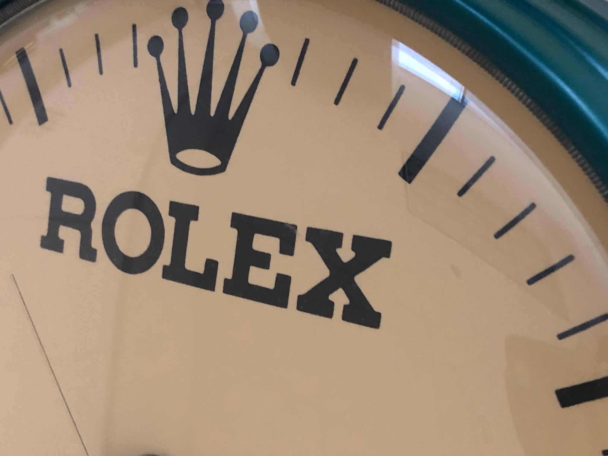 RARE Model Vintage Rolex Dealer Store Wall  Clock In Great  Condition. Measures 11 inches wide. Takes batteries 
