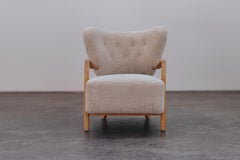 Raro sillón de estilo «Cabinetmaker» vintage de piel de cordero de Dinamarca, de alrededor de 1960