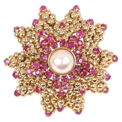 Tiffany & Co. Broche étoile de mer en or jaune 18K avec perles de rubis