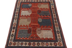 Rare tapis tribal vintage rouge avec photos beiges et bleues de Rug & Kilim