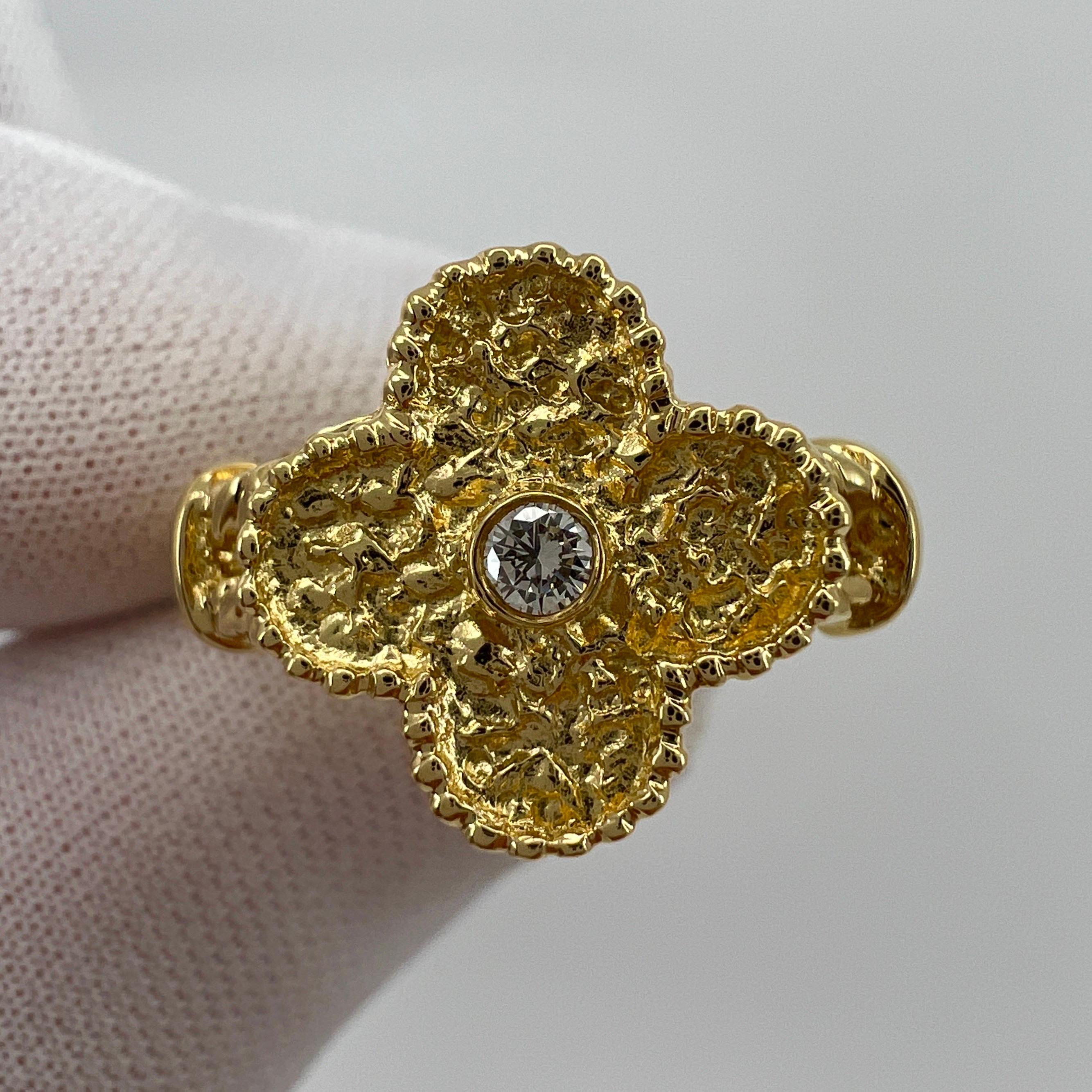 Vintage Van Cleef & Arpels Alhambra Diamond 18 Karat Yellow Gold Ring.

A stunning vintage ring with the classic Alhambra design by fine French jewellery house Van Cleef & Arpels. 
Set with a 0.05ct VVS diamond E/F colour on top of solid textured