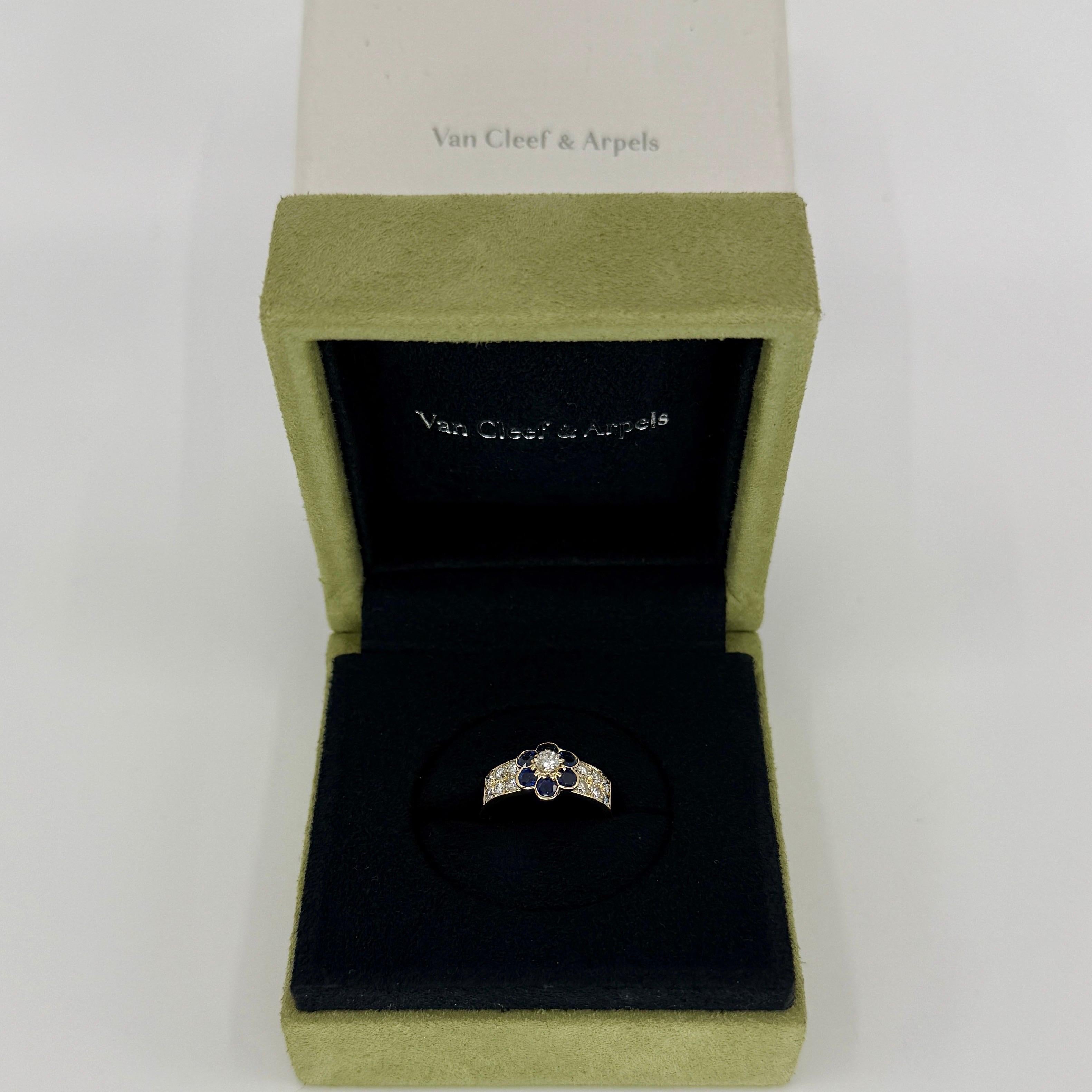 Rare Vintage Van Cleef & Arpels Blue Sapphire And Diamond 18k Yellow Gold Fleurette Flower Ring. 1.32ct total.

A stunning vintage ring with a unique floral design typical of Van Cleef & Arpels. Set with beautiful round cut natural diamonds and blue