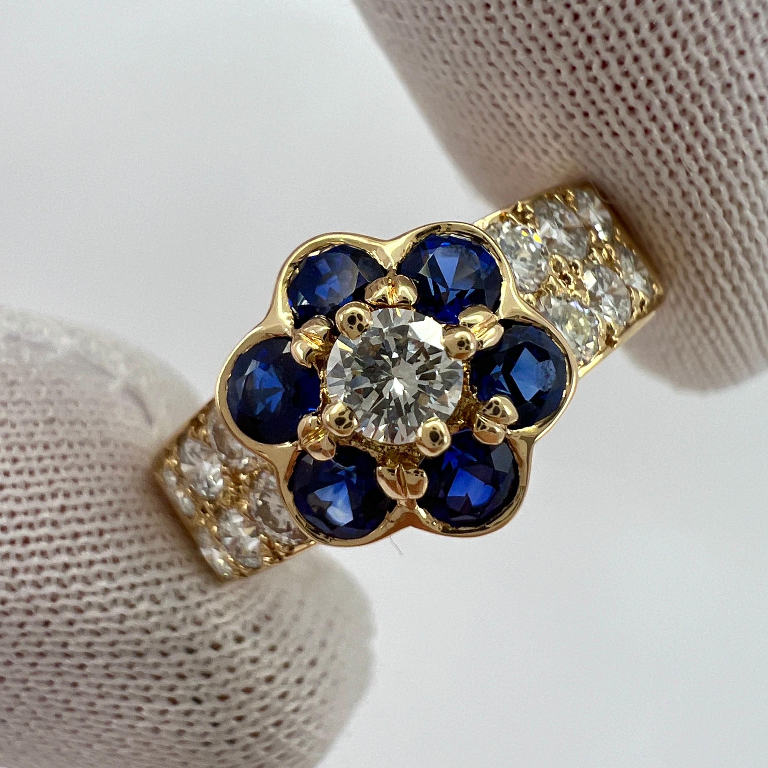 Fine Vintage Van Cleef & Arpels Blue Sapphire And Diamond 18k Yellow Gold Fleurette Flower Ring.

Une superbe bague vintage avec un design floral unique typique de Van Cleef & Arpels, sertie d'un magnifique saphir bleu naturel de taille ronde et de
