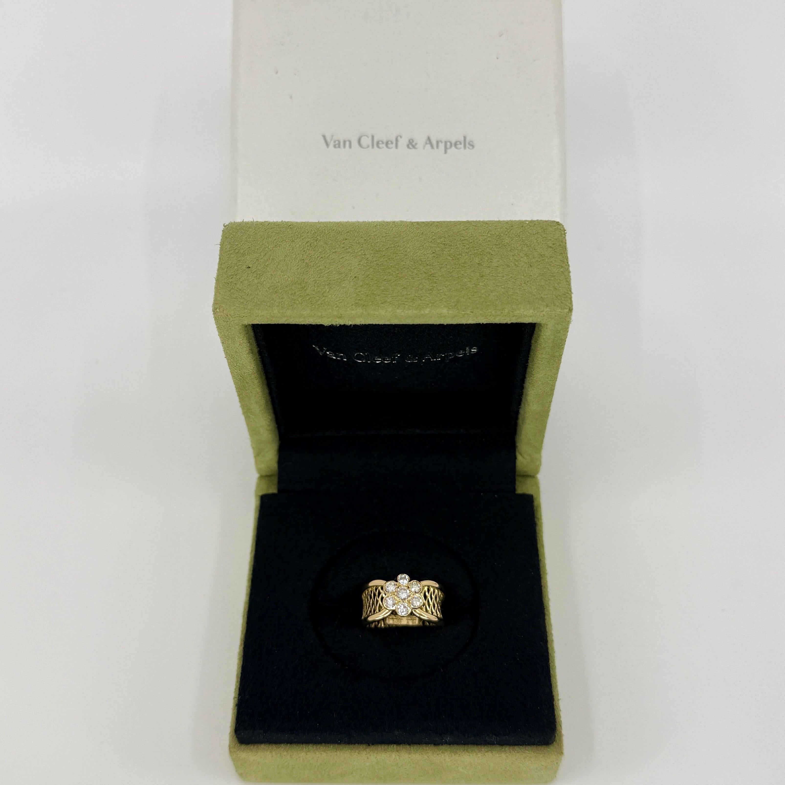 Rare Vintage Van Cleef & Arpels Diamond 18k Yellow Gold Flower Filigree Ring.

A stunning vintage ring with a unique floral design typical of Van Cleef & Arpels, set with beautiful natural round cut diamonds in a classic flower motif with a fine