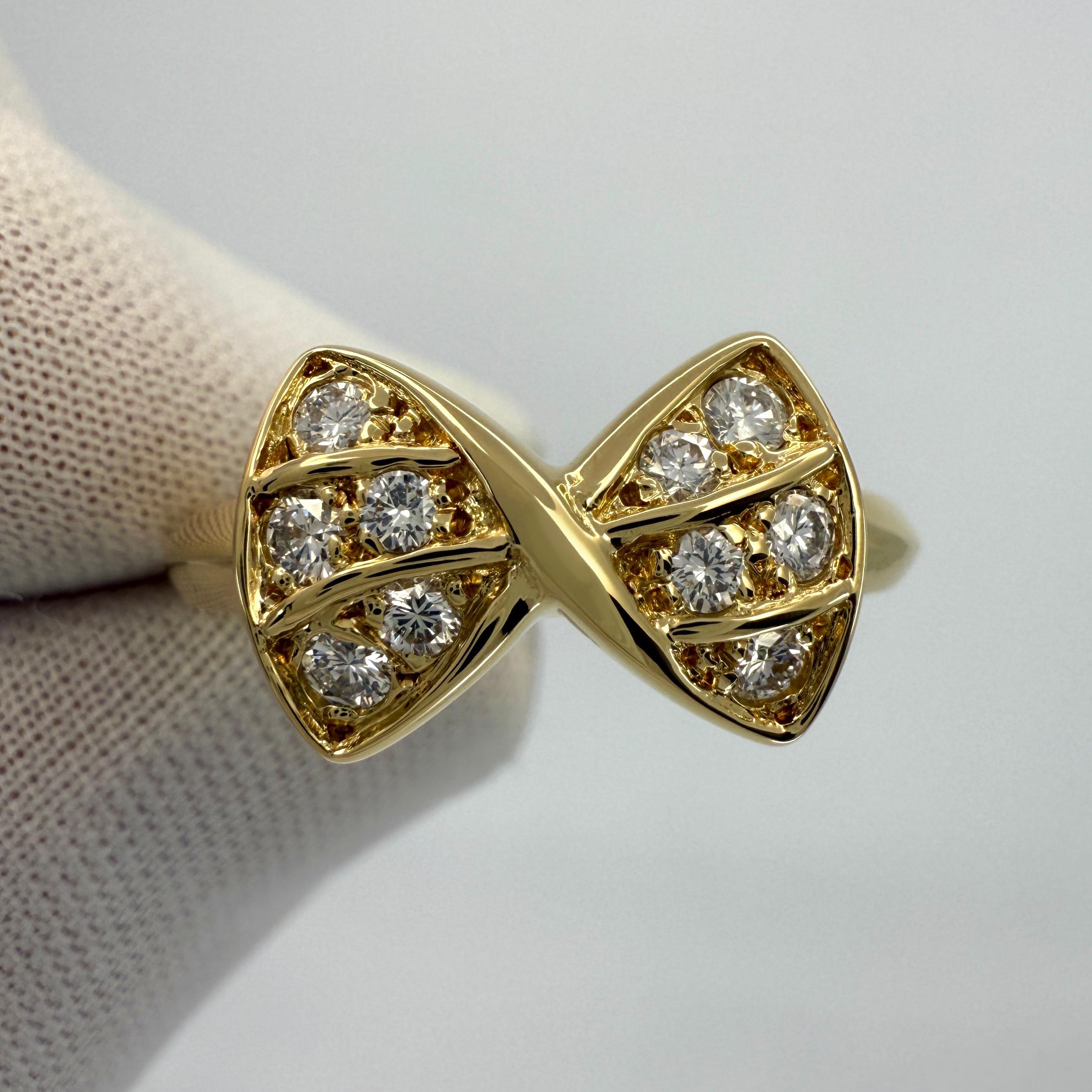 Round Cut Rare Vintage Van Cleef & Arpels Diamond Crossover Ribbon Bow Yellow Gold Ring For Sale