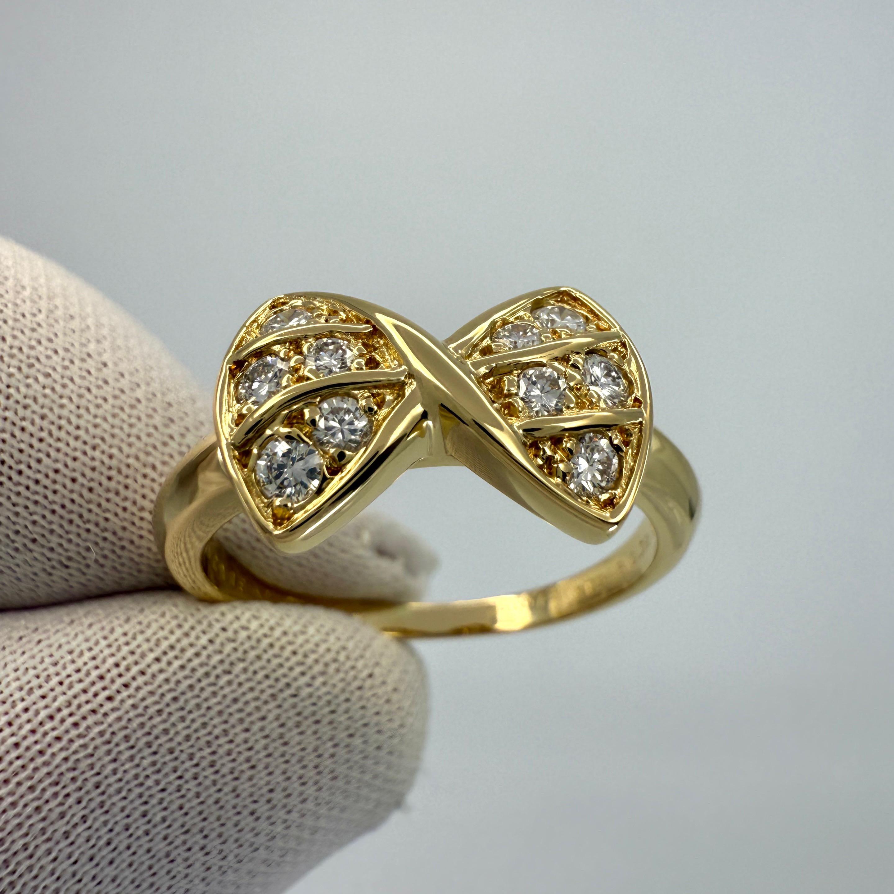 Rare Vintage Van Cleef & Arpels Diamond Crossover Ribbon Bow Yellow Gold Ring In Excellent Condition For Sale In Birmingham, GB