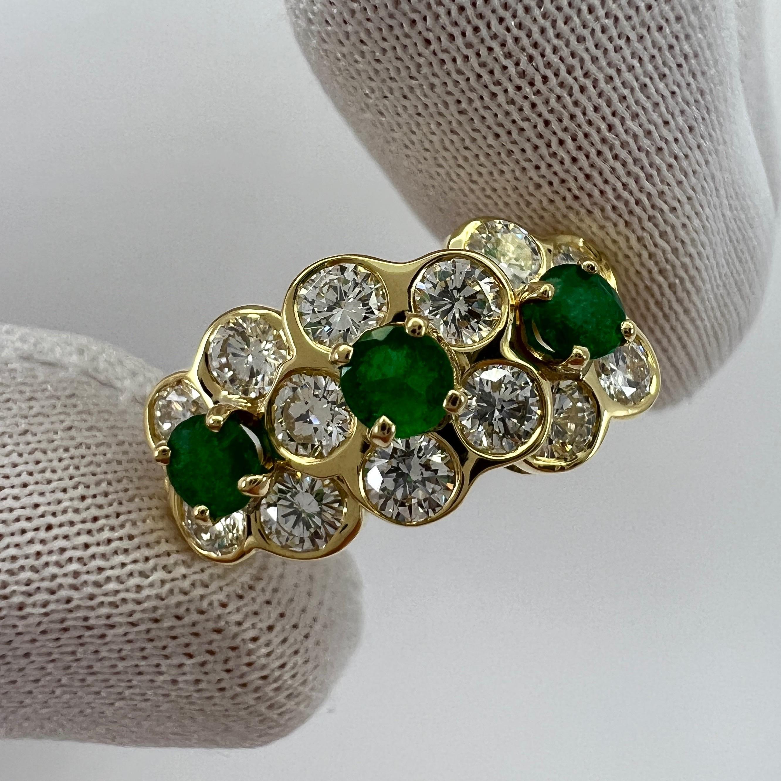 Fine Vintage Van Cleef & Arpels Emerald And Diamond 18k Yellow Gold Fleurette Flower Ring.

A stunning vintage ring with a unique floral design typical of Van Cleef & Arpels, set with beautiful natural round cut green emeralds and diamonds in a